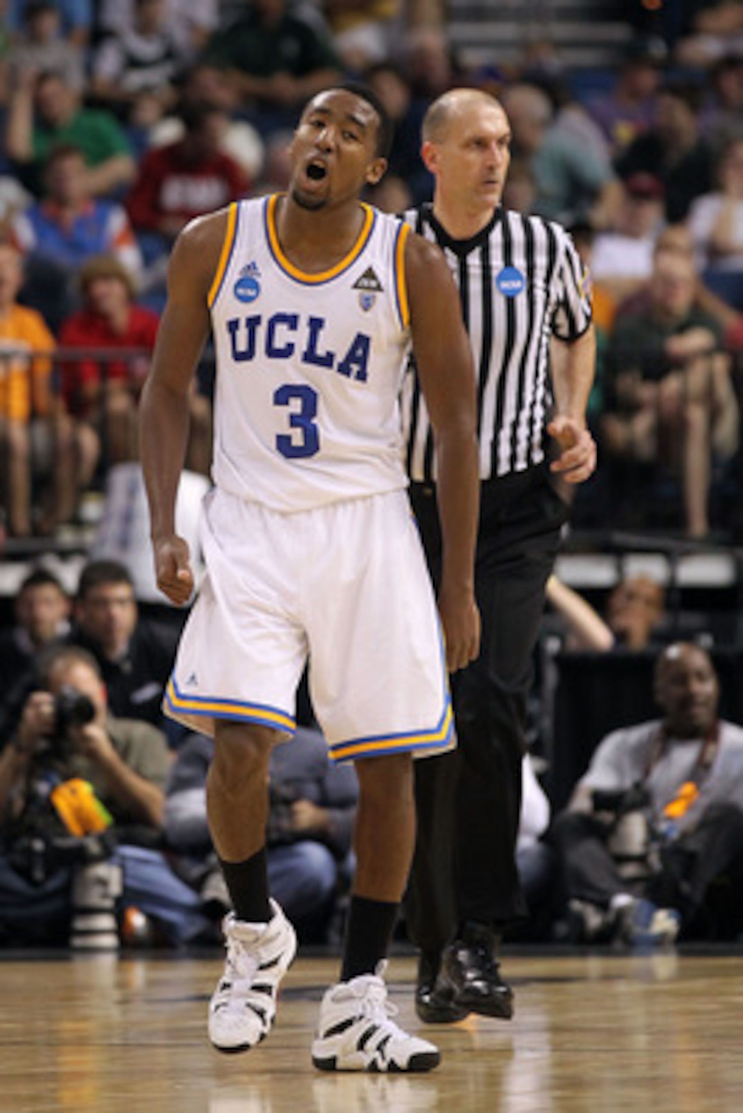 TAMPA, FL - MARCH 17: Malcolm Lee #3 of the UCLA Bruins reacts against the UCLA Bruins in the second half during the second round of the 2011 NCAA men's basketball tournament at St. Pete Times Forum on March 17, 2011 in Tampa, Florida. (Photo by Mike Eh TAMPA, FL - MARCH 17: Malcolm Lee #3 of the UCLA Bruins reacts against the UCLA Bruins in the second half during the second round of the 2011 NCAA men's basketball tournament at St. Pete Times Forum on March 17, 2011 in Tampa, Florida. (Photo by Mike Eh