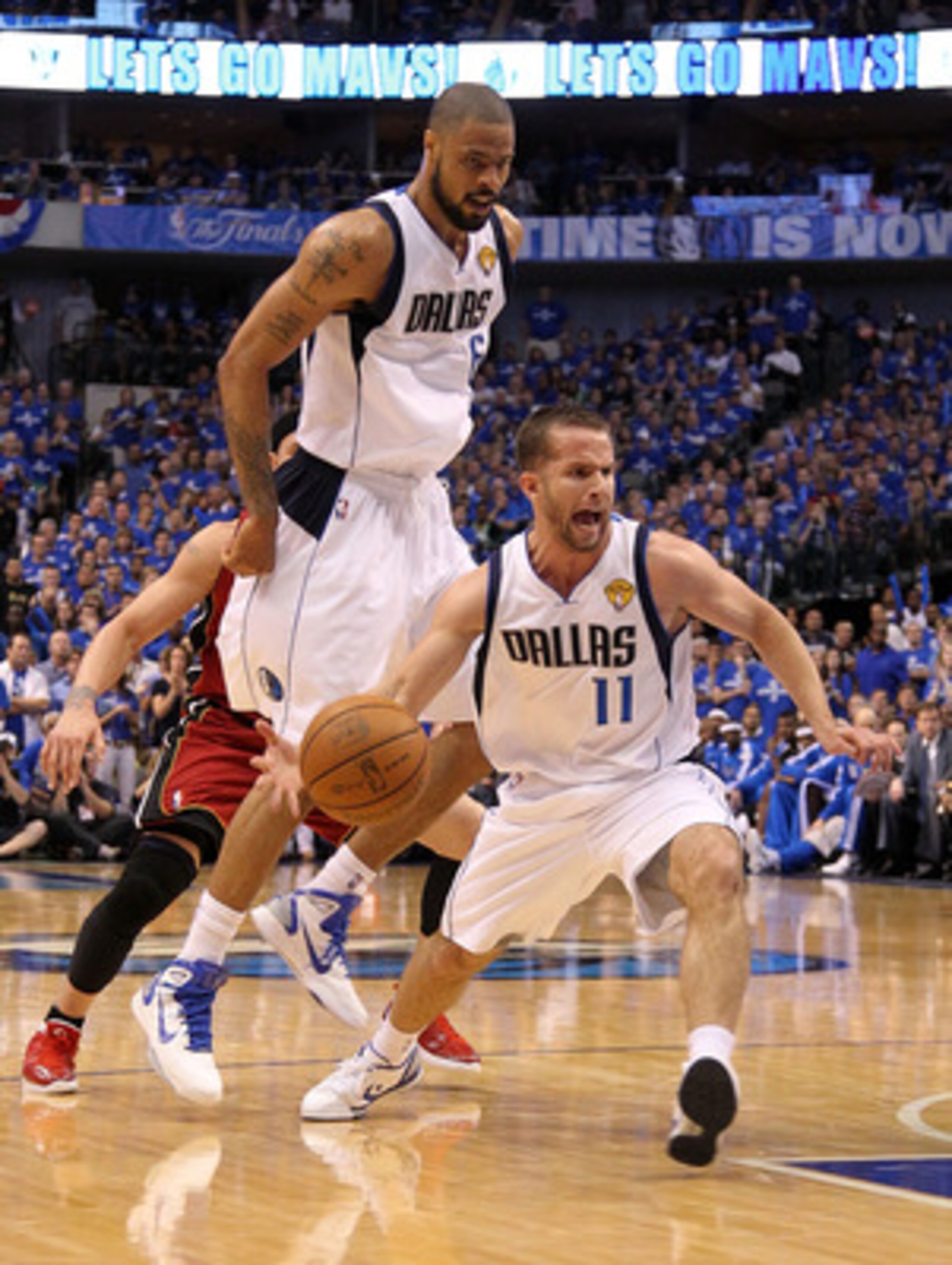 DALLAS, TX - JUNE 07:  Jose Juan Barea #11 of the Dallas Mavericks drives against the Miami Heat in Game Four of the 2011 NBA Finals at American Airlines Center on June 7, 2011 in Dallas, Texas. NOTE TO USER: User expressly acknowledges and agrees that, b