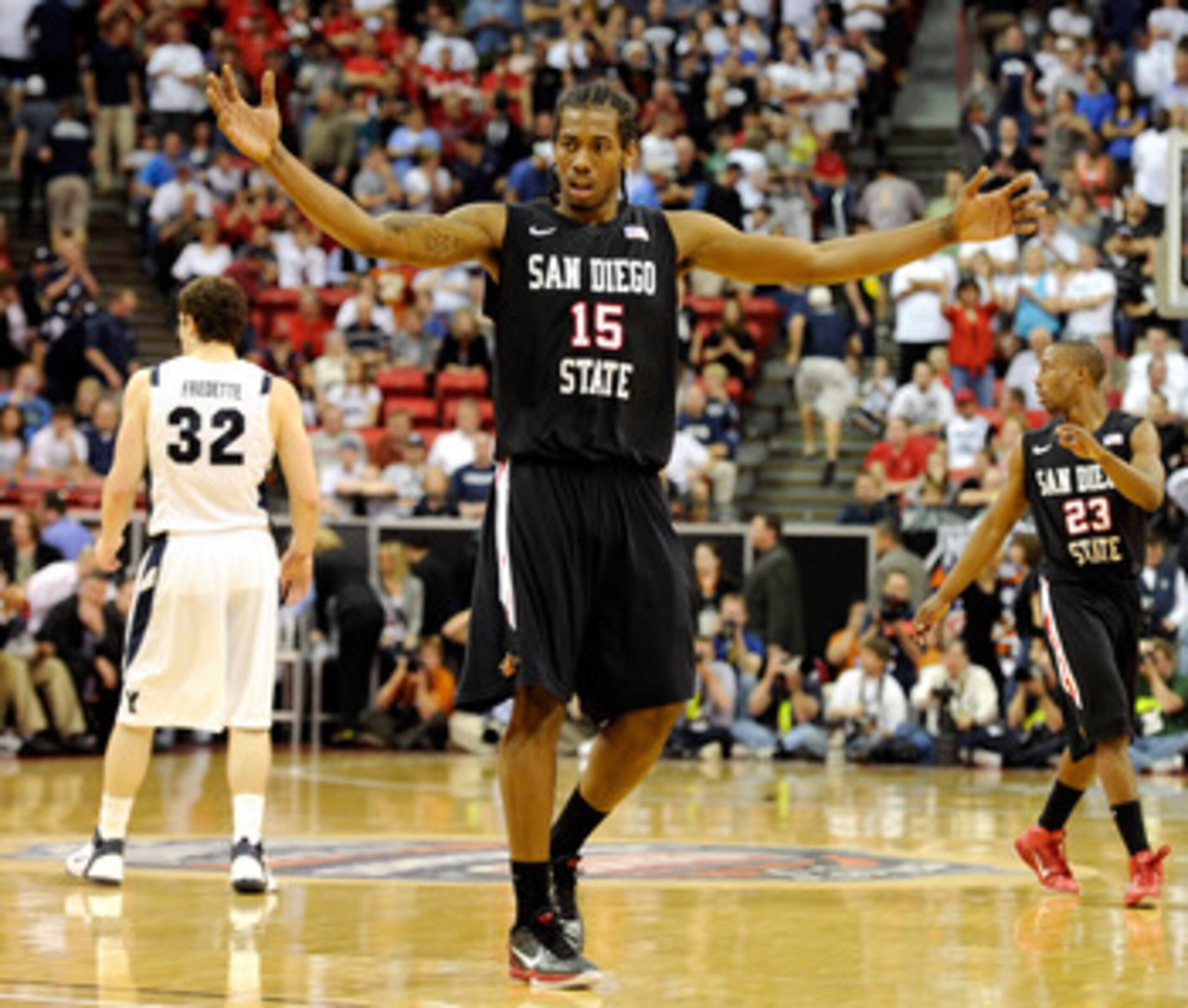 LAS VEGAS, NV - MARCH 12: Kawhi Leonard #15 of the San Diego State Aztecs raises his arms in the last few seconds of the team's 72-54 victory over the Brigham Young University Cougars in the championship game of the Conoco Mountain West Conference Basket LAS VEGAS, NV - MARCH 12: Kawhi Leonard #15 of the San Diego State Aztecs raises his arms in the last few seconds of the team's 72-54 victory over the Brigham Young University Cougars in the championship game of the Conoco Mountain West Conference Basket