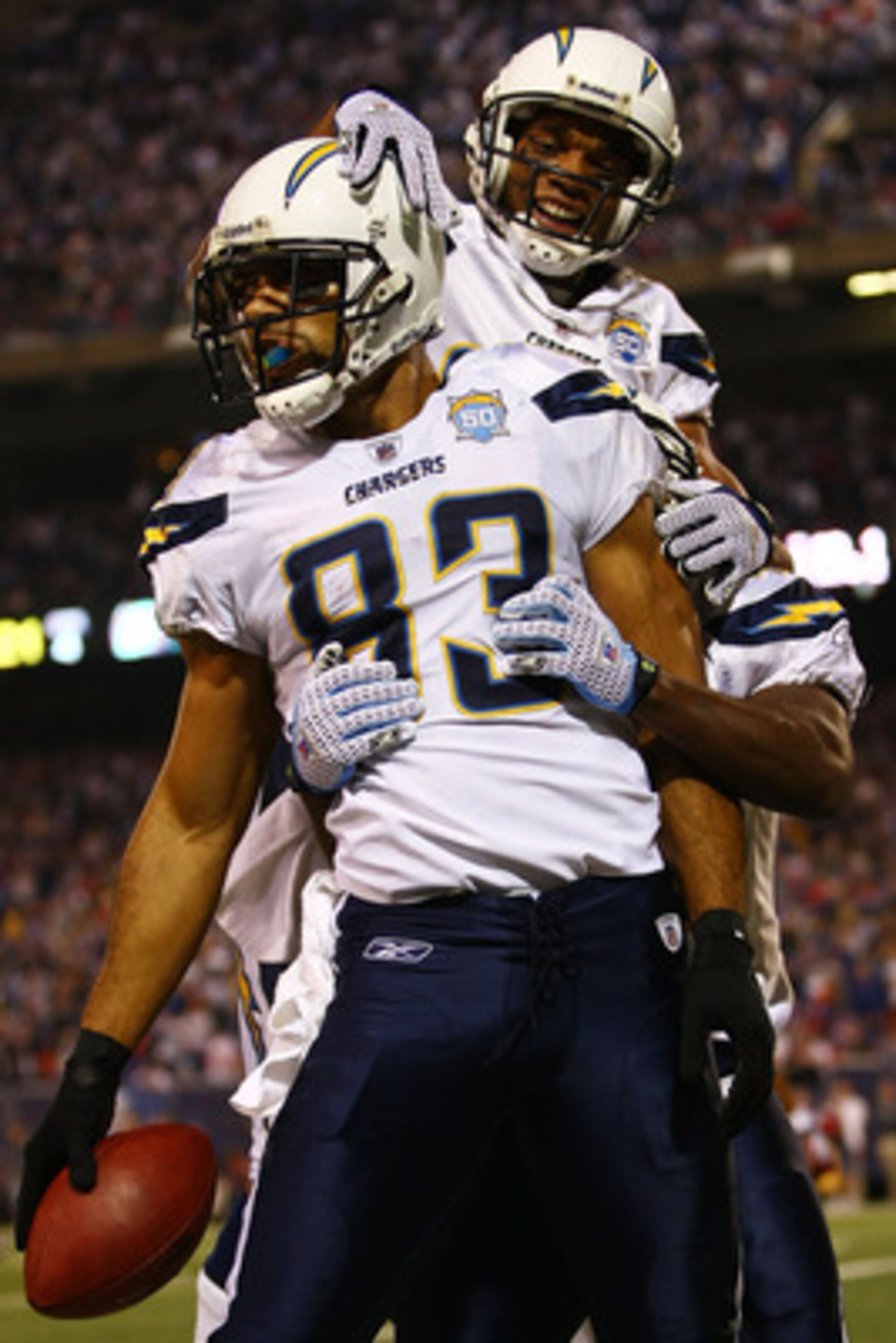 EAST RUTHERFORD, NJ - NOVEMBER 08: Vincent Jackson #83 of the San Diego Chargers celebrates his go-ahead touchdown with teammate Malcolm Floyd #80 against the New York Giants on November 8, 2009 at Giants Stadium in East Rutherford, New Jersey. (Photo by EAST RUTHERFORD, NJ - NOVEMBER 08: Vincent Jackson #83 of the San Diego Chargers celebrates his go-ahead touchdown with teammate Malcolm Floyd #80 against the New York Giants on November 8, 2009 at Giants Stadium in East Rutherford, New Jersey. (Photo by
