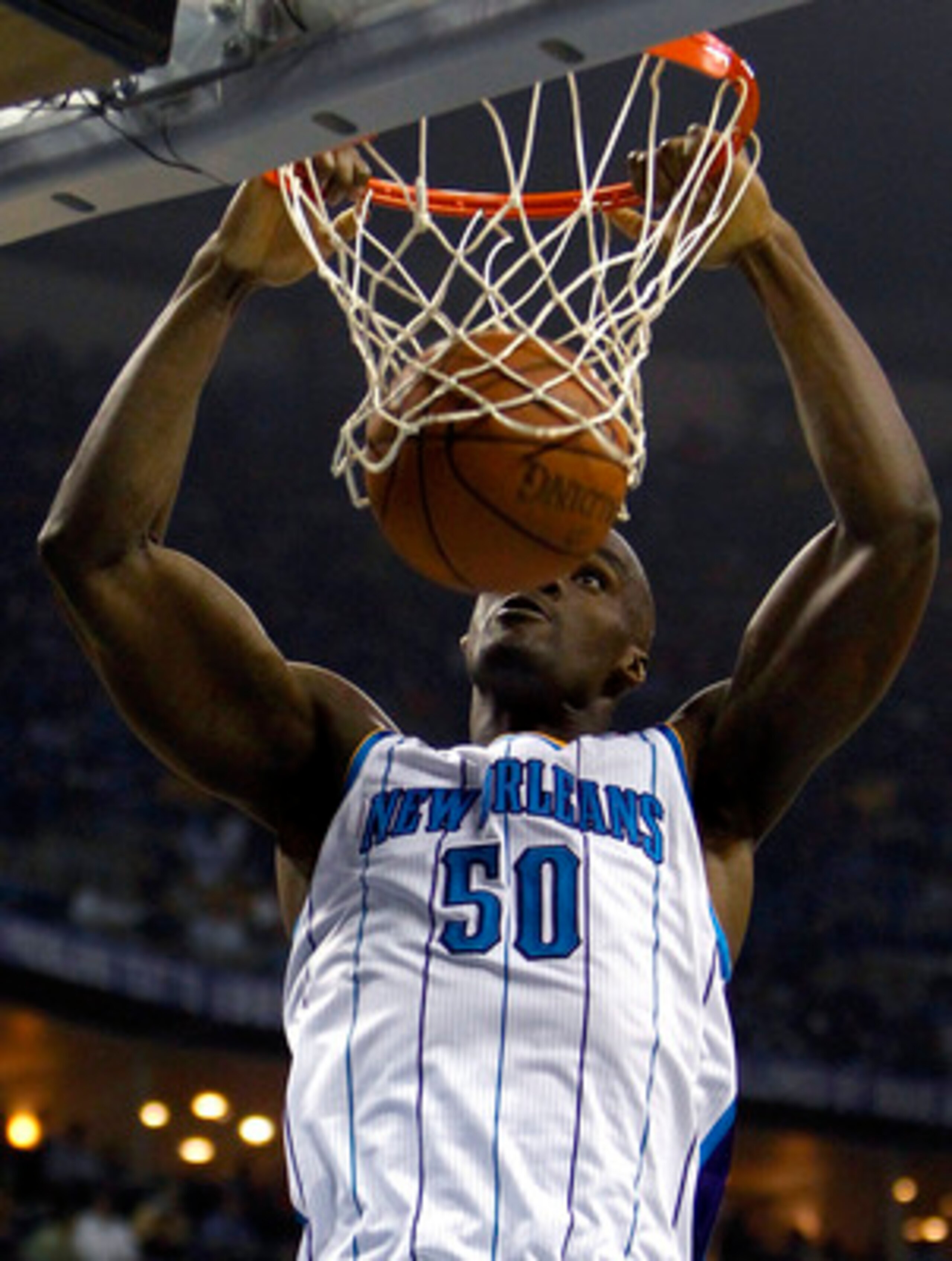 NEW ORLEANS - APRIL 24:  Emeka Okafor #50 of the New Orleans Hornets dunks against the Los Angeles Lakers in Game Four of the Western Conference Quarterfinals in the 2011 NBA Playoffs at New Orleans Arena on April 24, 2011 in New Orleans, Louisiana. NOTE 