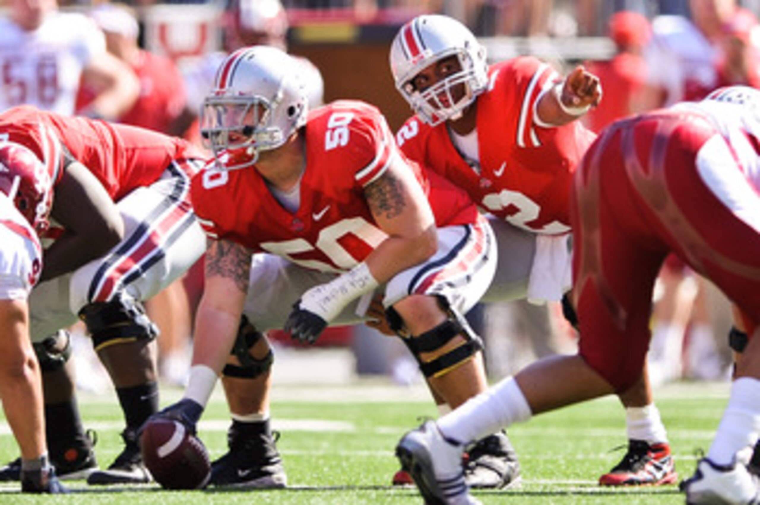 COLUMBUS, OH - OCTOBER 9:  Quarterback Terrelle Pryor #2 of the Ohio State Buckeyes directs the play while waiting for the snap from center Michael Brewster #50 of the Ohio State Buckeyes against the Indiana Hoosiers at Ohio Stadium on October 9, 2010 in