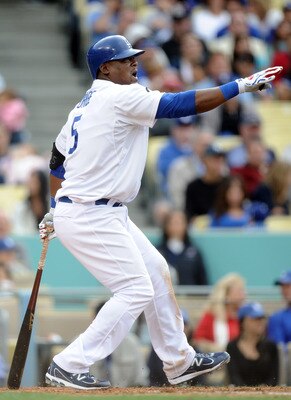 LOS ANGELES, CA - MAY 14:  Juan Uribe #5 of the Los Angeles Dodgers reacts to his strikeout against the Arizona Diamondbacks during the seventh inning at Dodger Stadium on May 14, 2011 in Los Angeles, California.  (Photo by Harry How/Getty Images)