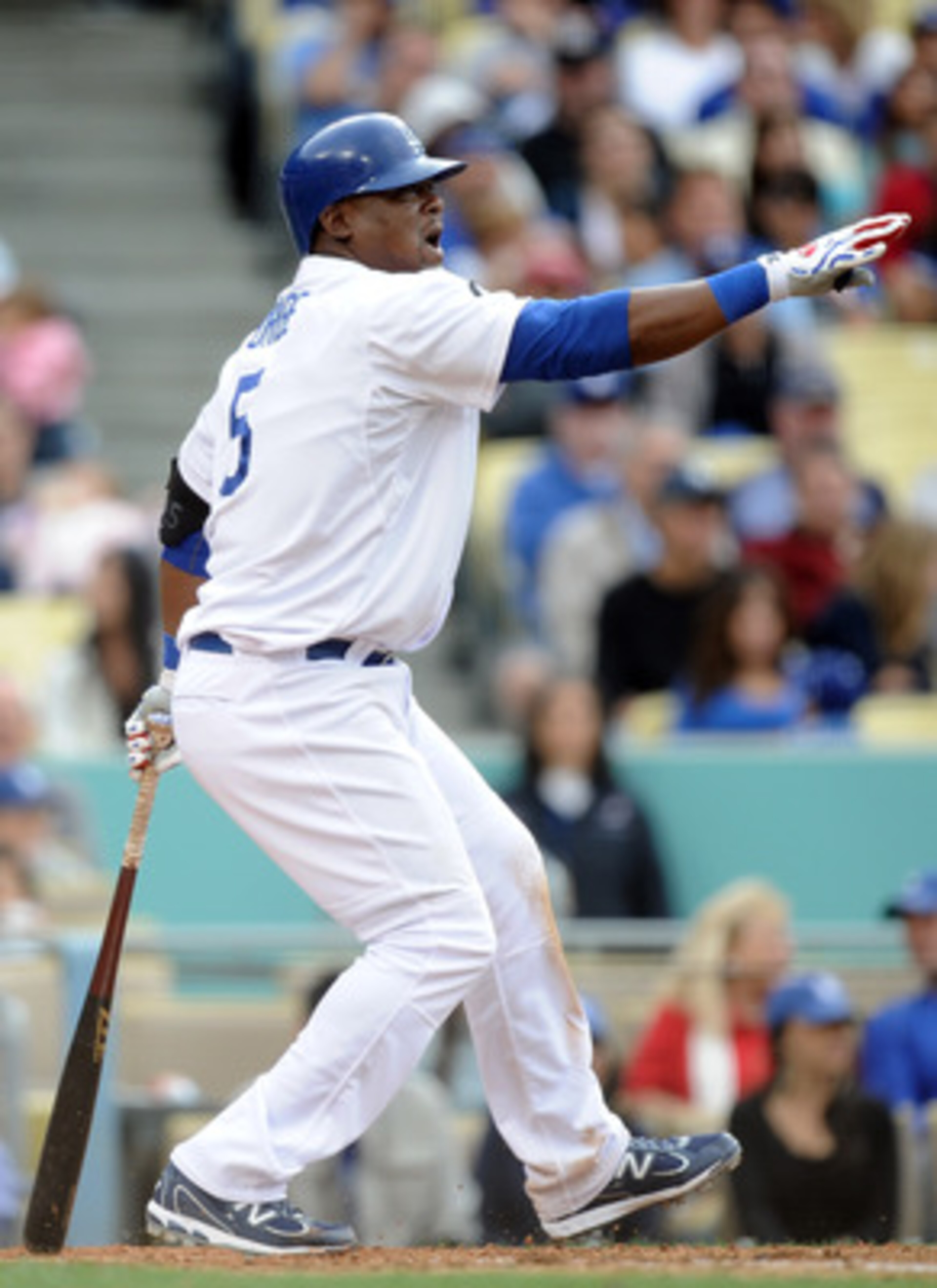 LOS ANGELES, CA - MAY 14: Juan Uribe #5 of the Los Angeles Dodgers reacts to his strikeout against the Arizona Diamondbacks during the seventh inning at Dodger Stadium on May 14, 2011 in Los Angeles, California. (Photo by Harry How/Getty Images) LOS ANGELES, CA - MAY 14: Juan Uribe #5 of the Los Angeles Dodgers reacts to his strikeout against the Arizona Diamondbacks during the seventh inning at Dodger Stadium on May 14, 2011 in Los Angeles, California. (Photo by Harry How/Getty Images)