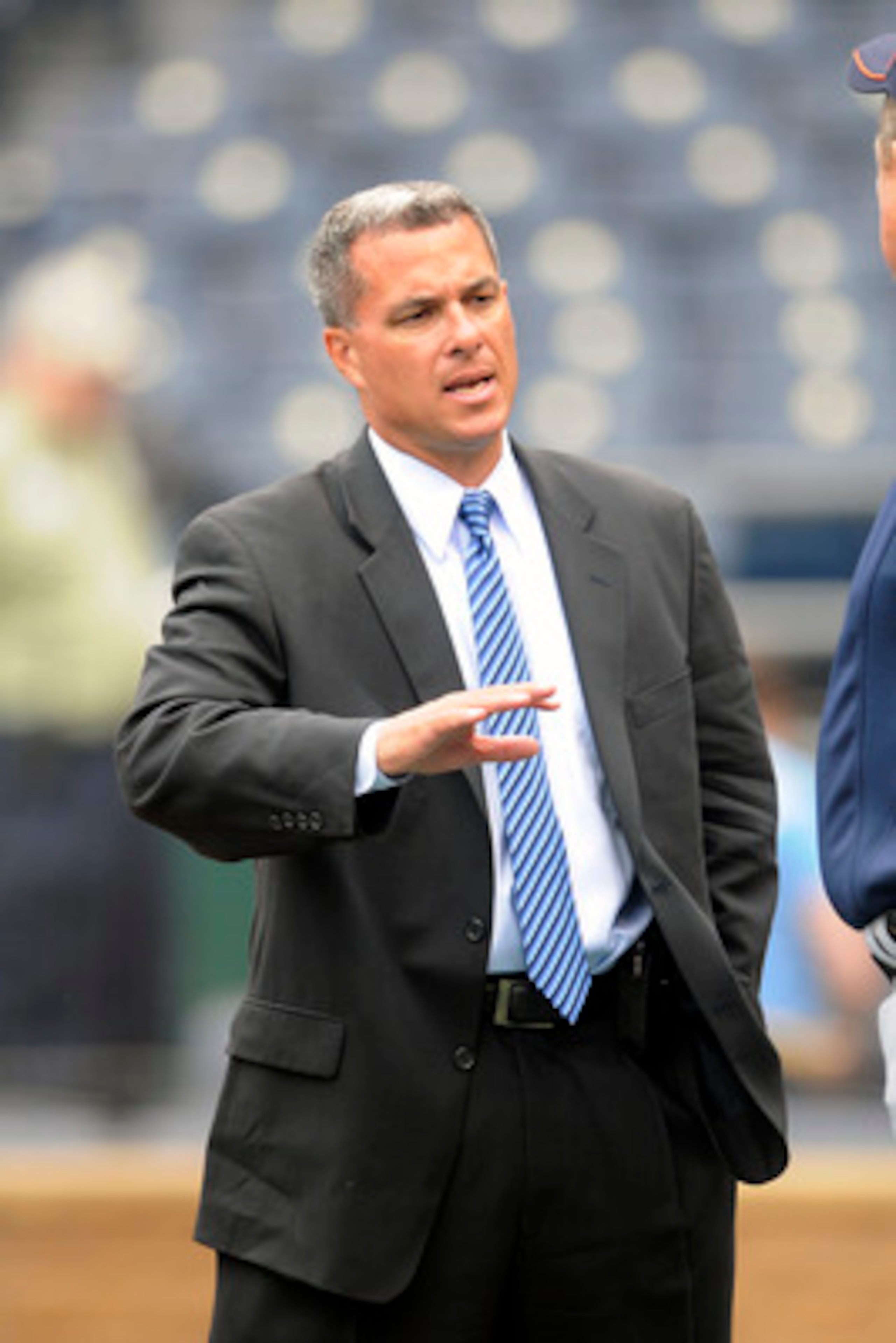 KANSAS CITY, MO - APRIL 05: General Manager Dayton Moore of the Kansas City Royals visits on the field prior to the 2010 home opener against the Detroit Tigers on April 5, 2010 at Kauffman Stadium in Kansas City, Missouri. (Photo by G. Newman Lowrance/Get