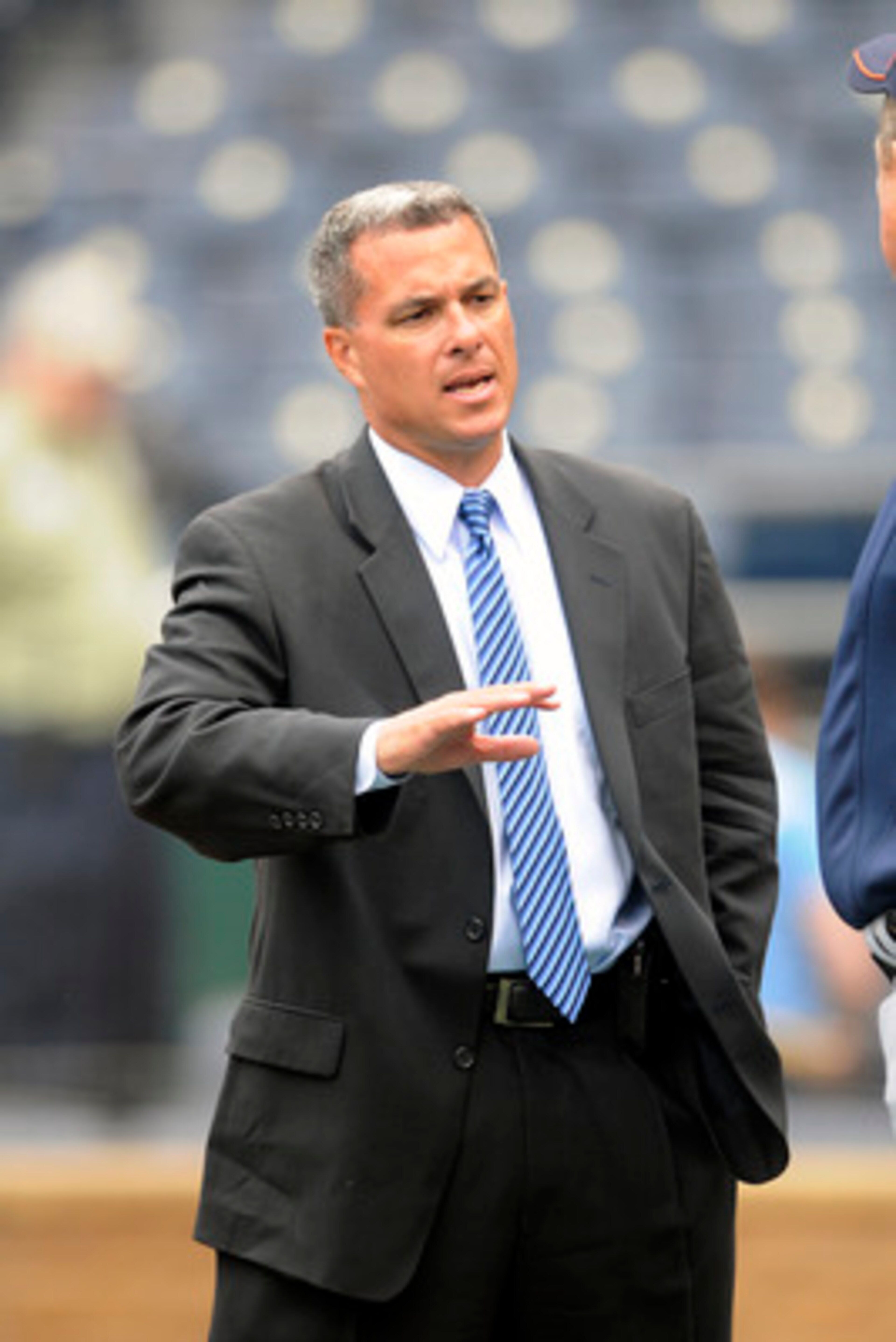 KANSAS CITY, MO - APRIL 05: General Manager Dayton Moore of the Kansas City Royals visits on the field prior to the 2010 home opener against the Detroit Tigers on April 5, 2010 at Kauffman Stadium in Kansas City, Missouri. (Photo by G. Newman Lowrance/Get KANSAS CITY, MO - APRIL 05: General Manager Dayton Moore of the Kansas City Royals visits on the field prior to the 2010 home opener against the Detroit Tigers on April 5, 2010 at Kauffman Stadium in Kansas City, Missouri. (Photo by G. Newman Lowrance/Get