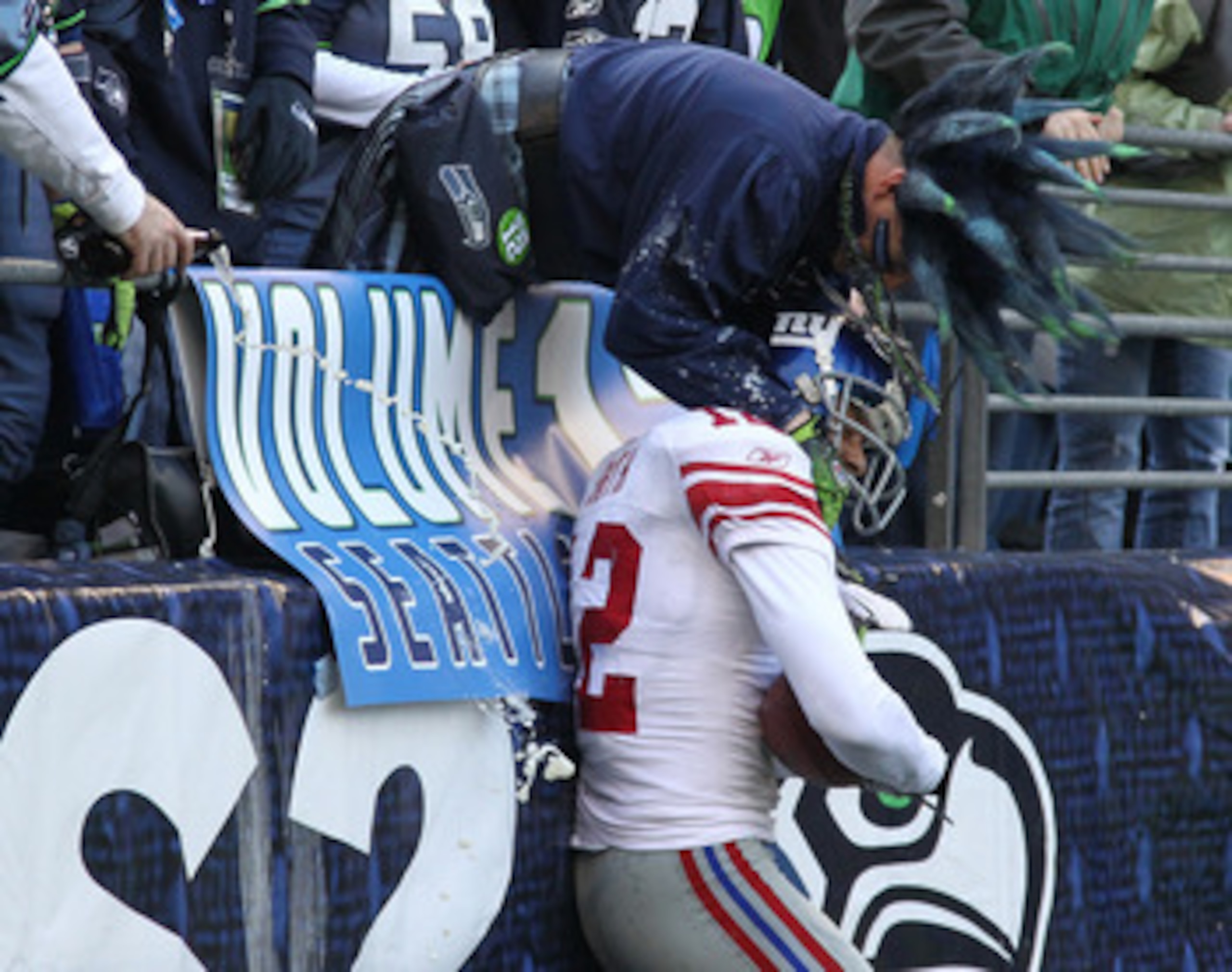 SEATTLE - NOVEMBER 07:  Wide receiver Steve Smith #12 of the New York Giants gets doused with beer after scoring a touchdown against the Seattle Seahawks at Qwest Field on November 7, 2010 in Seattle, Washington. The Giants defeated the Seahawks 41-7. (Ph
