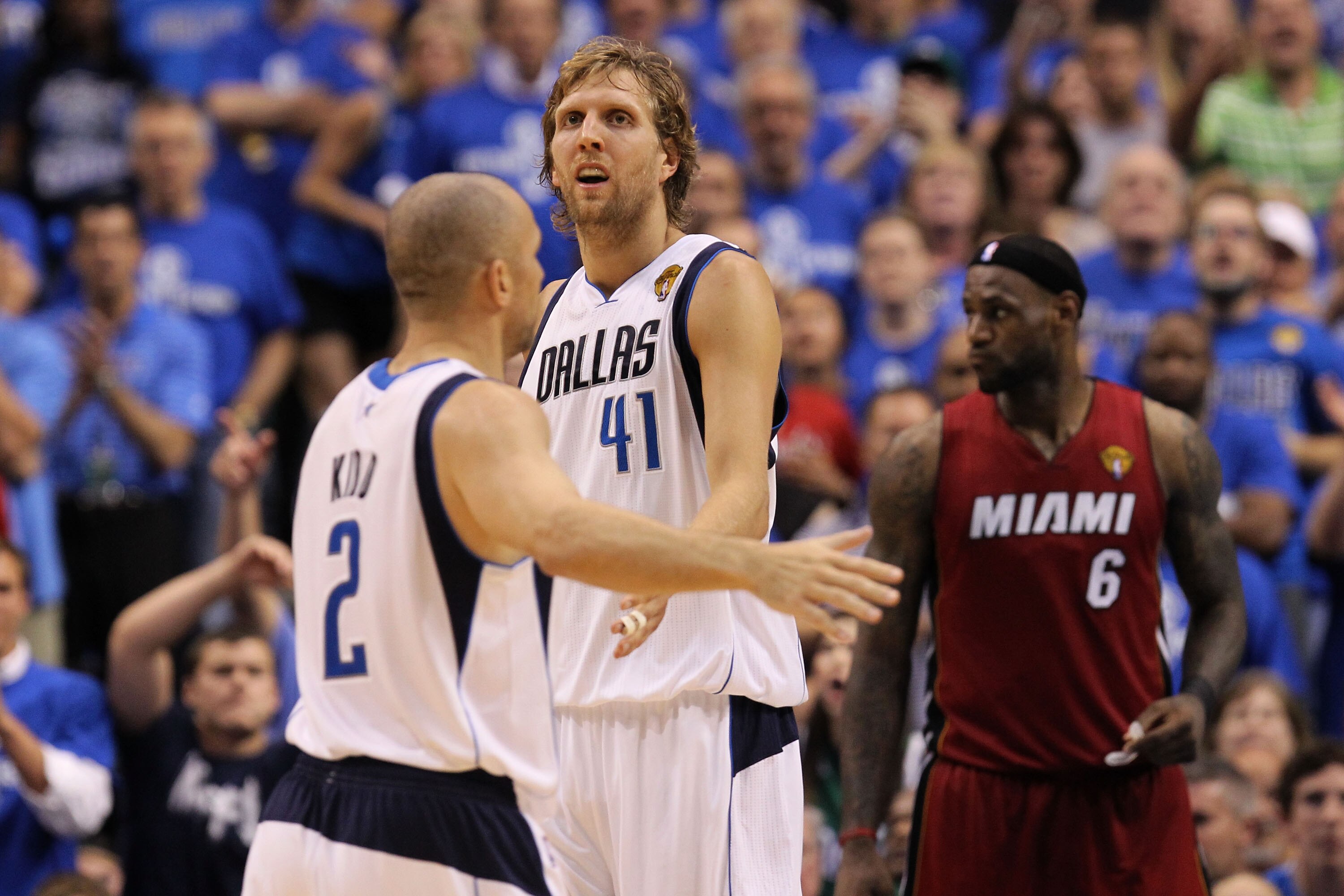DALLAS, TX - JUNE 07:  (L-R) Jaosn Kidd #2 and Dirk Nowitzki #41 of the Dallas Mavericks celebrate a play as LeBron James #6 of the Miami Heat looks on in Game Four of the 2011 NBA Finals at American Airlines Center on June 7, 2011 in Dallas, Texas. The M