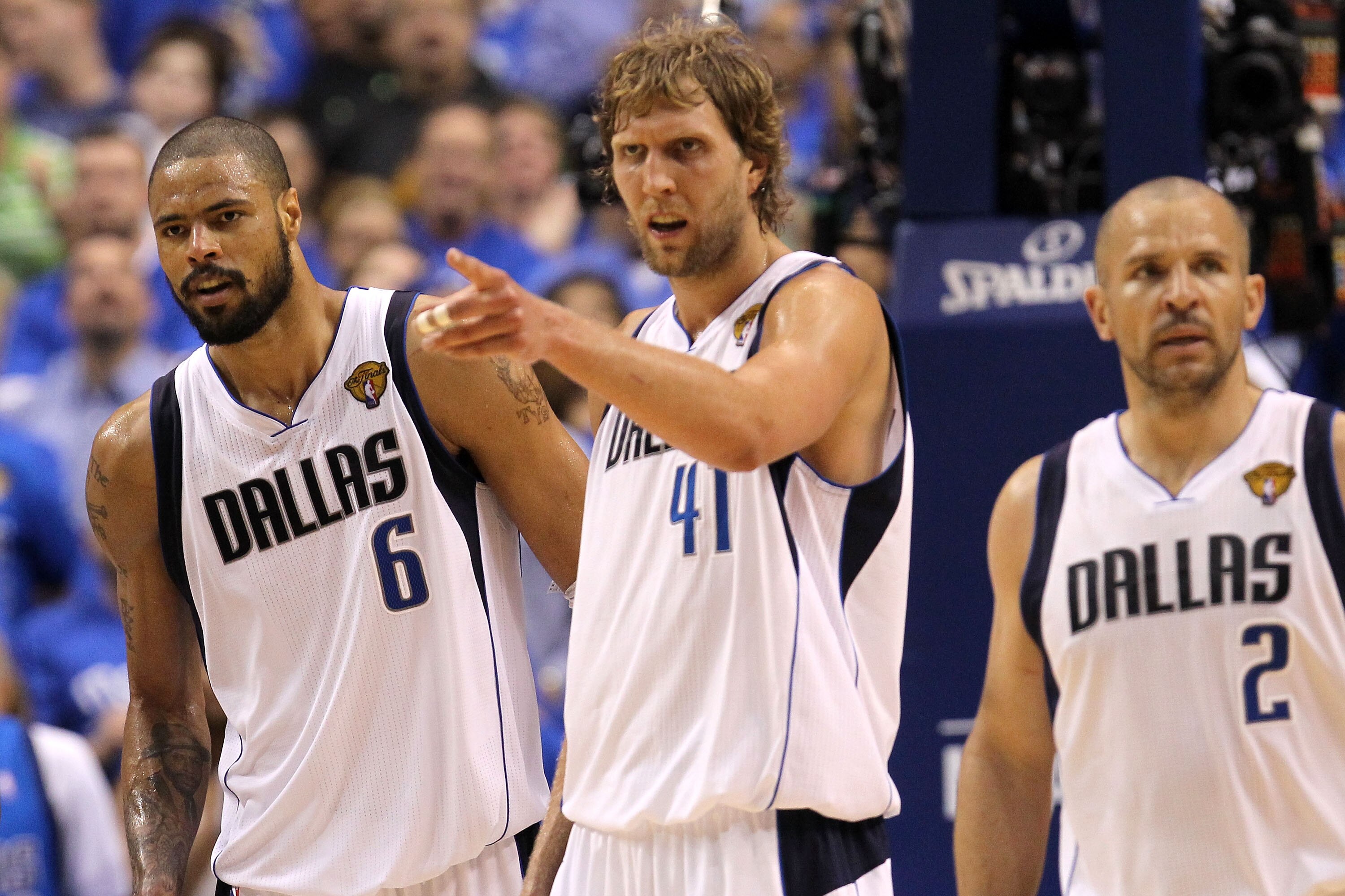 DALLAS, TX - JUNE 07:  (L-R) Tyson Chandler #6, Dirk Nowitzki #41 and Jason Kidd #2 of the Dallas Mavericks look on against the Miami Heat in Game Four of the 2011 NBA Finals at American Airlines Center on June 7, 2011 in Dallas, Texas. NOTE TO USER: User