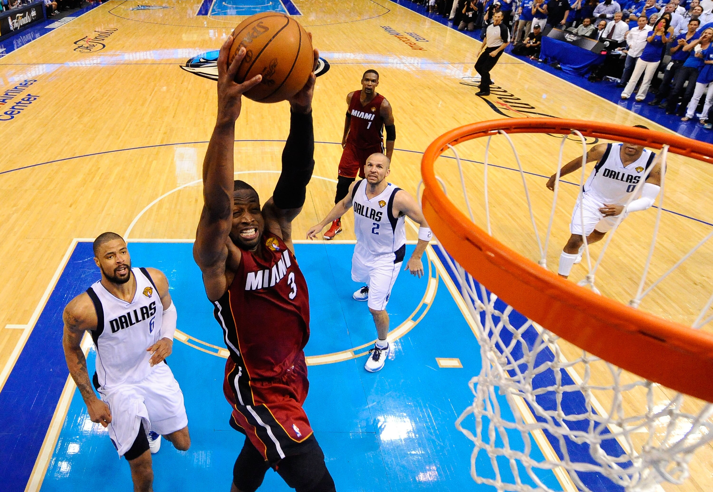 DALLAS, TX - JUNE 07:  Dwyane Wade #3 of the Miami Heat dunks against the Dallas Mavericks in Game Four of the 2011 NBA Finals at American Airlines Center on June 7, 2011 in Dallas, Texas. NOTE TO USER: User expressly acknowledges and agrees that, by down