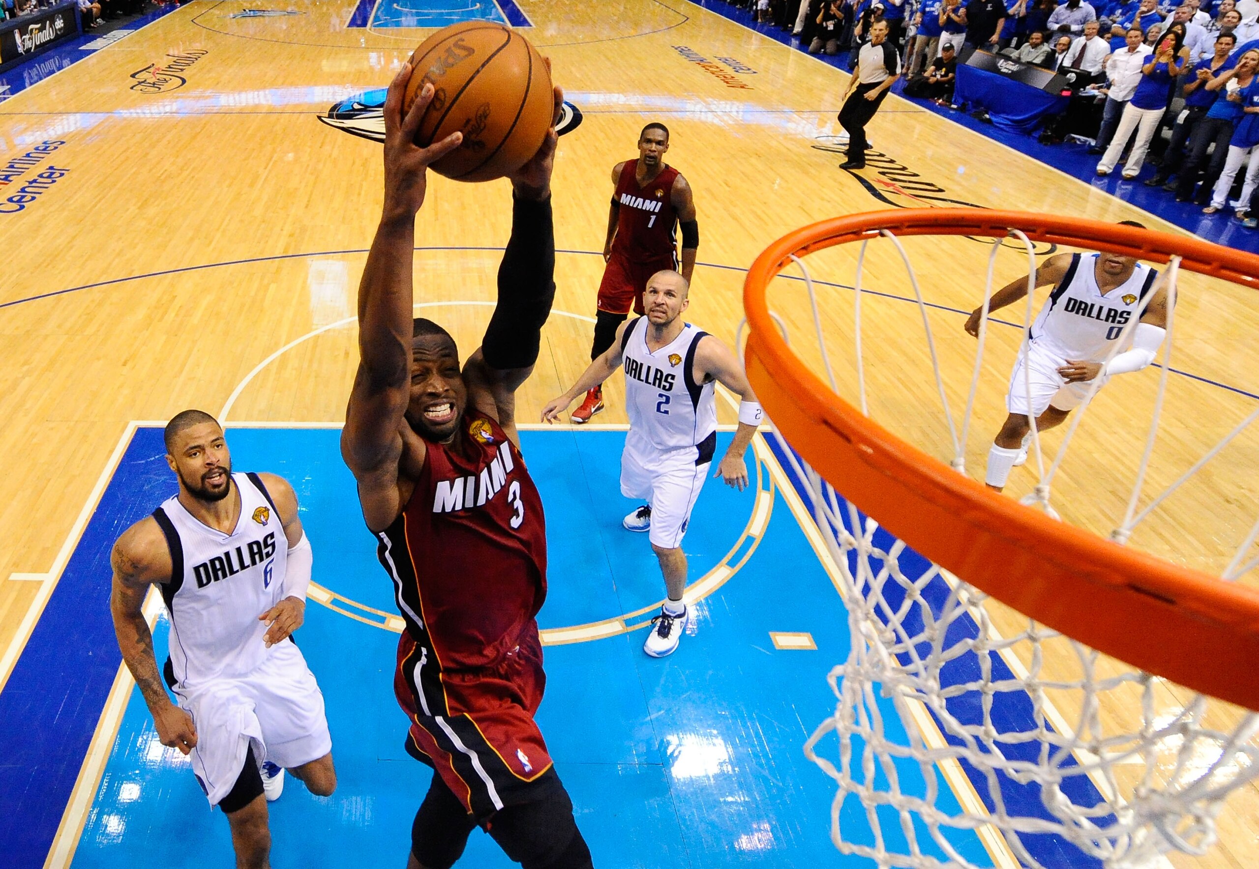 DALLAS, TX - JUNE 07: Dwyane Wade #3 of the Miami Heat dunks against the Dallas Mavericks in Game Four of the 2011 NBA Finals at American Airlines Center on June 7, 2011 in Dallas, Texas. NOTE TO USER: User expressly acknowledges and agrees that, by down DALLAS, TX - JUNE 07: Dwyane Wade #3 of the Miami Heat dunks against the Dallas Mavericks in Game Four of the 2011 NBA Finals at American Airlines Center on June 7, 2011 in Dallas, Texas. NOTE TO USER: User expressly acknowledges and agrees that, by down