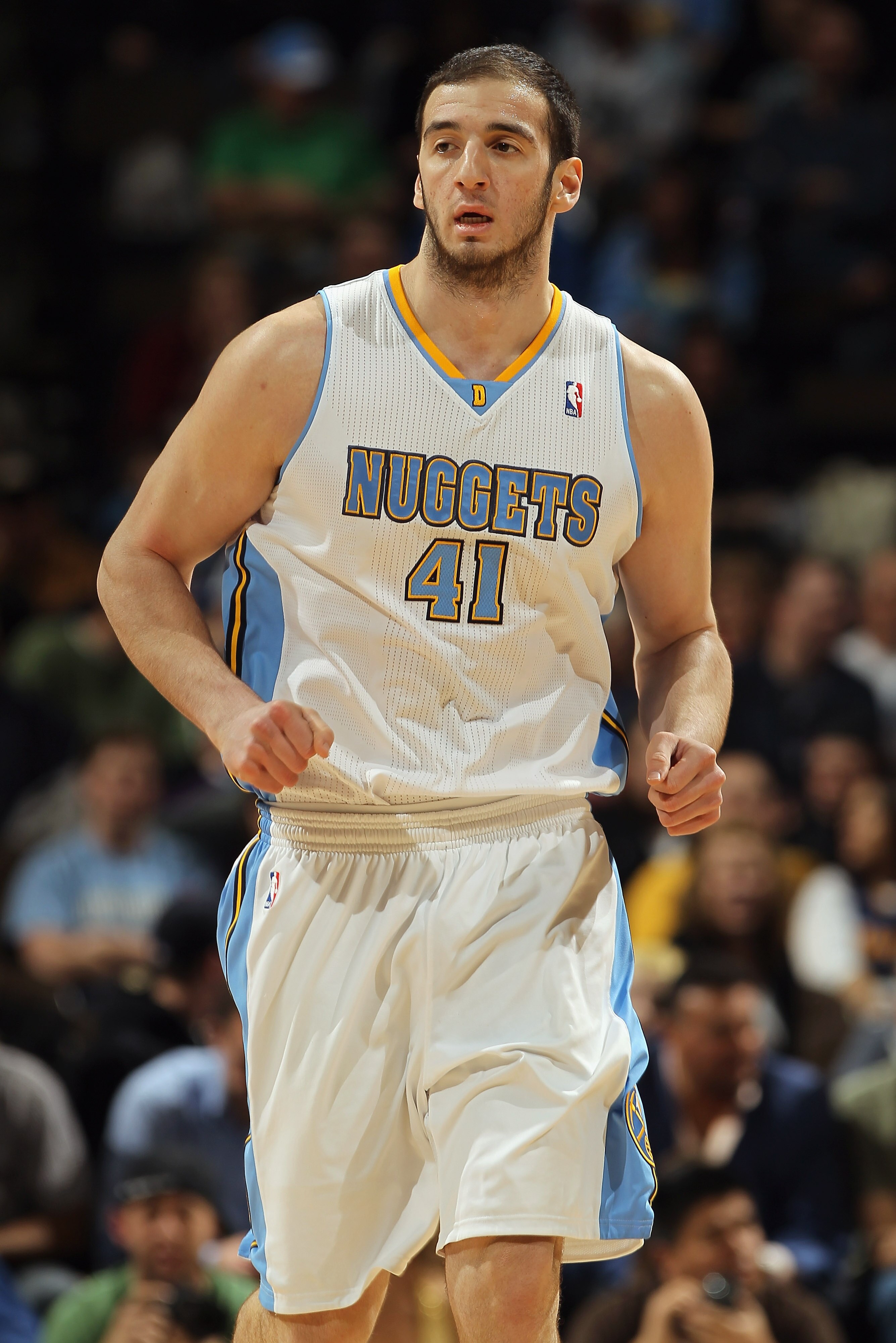DENVER, CO - MARCH 02:  Kosta Koufos #41 of the Denver Nuggets heads up court against the Charlotte Bobcats at the Pepsi Center on March 2, 2011 in Denver, Colorado. The Nuggets defeated the Bobcats 120-80.NOTE TO USER: User expressly acknowledges and agr