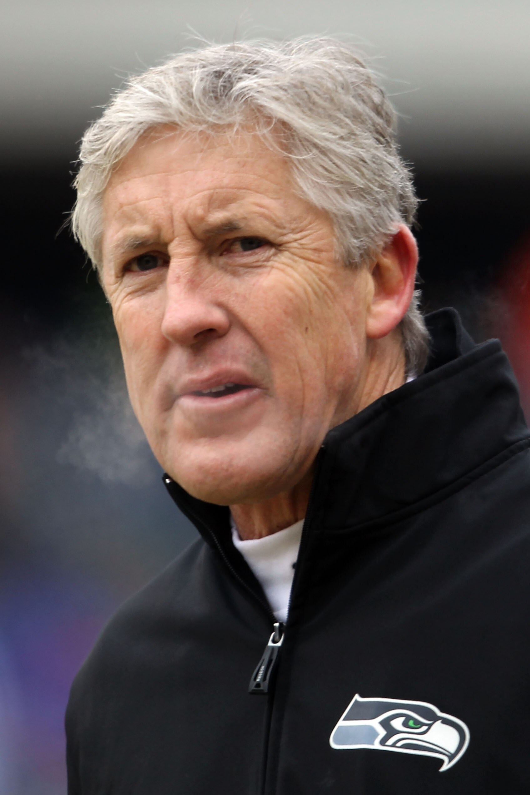 CHICAGO, IL - JANUARY 16: Head coach Pete Carroll of the Seattle Seahawks looks on during pregame warmups before the Seahawks take on the Chicago Bears in the 2011 NFC divisional playoff game at Soldier Field on January 16, 2011 in Chicago, Illinois. (P CHICAGO, IL - JANUARY 16: Head coach Pete Carroll of the Seattle Seahawks looks on during pregame warmups before the Seahawks take on the Chicago Bears in the 2011 NFC divisional playoff game at Soldier Field on January 16, 2011 in Chicago, Illinois. (P