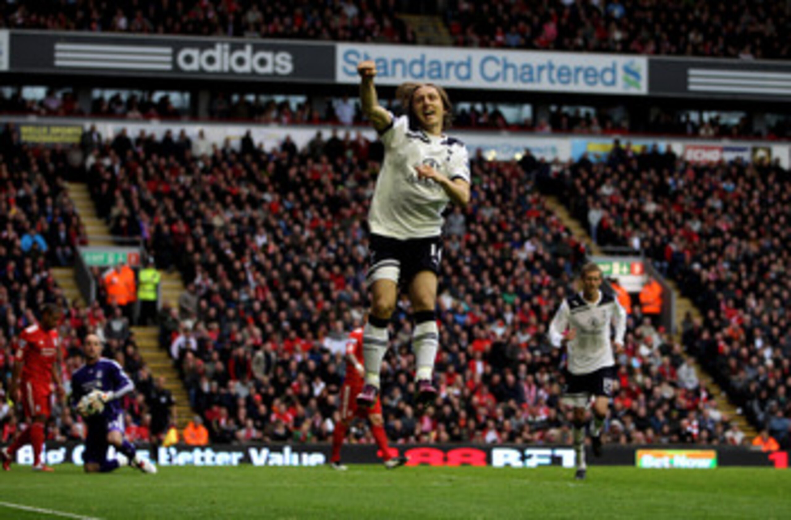 LIVERPOOL, ENGLAND - MAY 15:  Luka Modric of Spurs cedlebrates after scoring his team's second goal from the penalty spot during the Barclays Premier League match between Liverpool and Tottenham Hotspur at Anfield on May 15, 2011 in Liverpool, England.  (