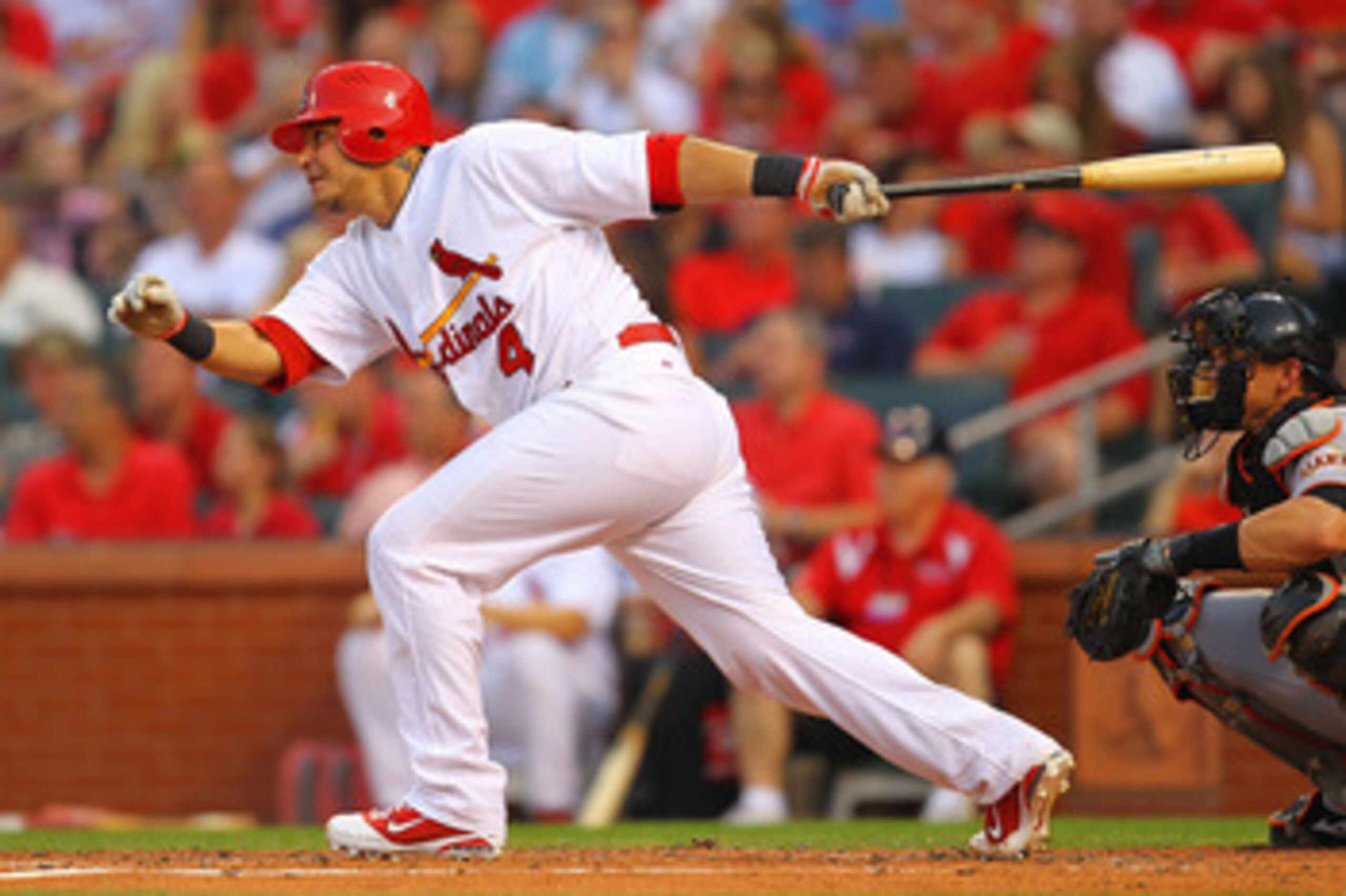 ST. LOUIS, MO - JUNE 1: Yadier Molina #4 of the St. Louis Cardinals collects a single against the San Francisco Giants at Busch Stadium on June 1, 2011 in St. Louis, Missouri.  (Photo by Dilip Vishwanat/Getty Images)