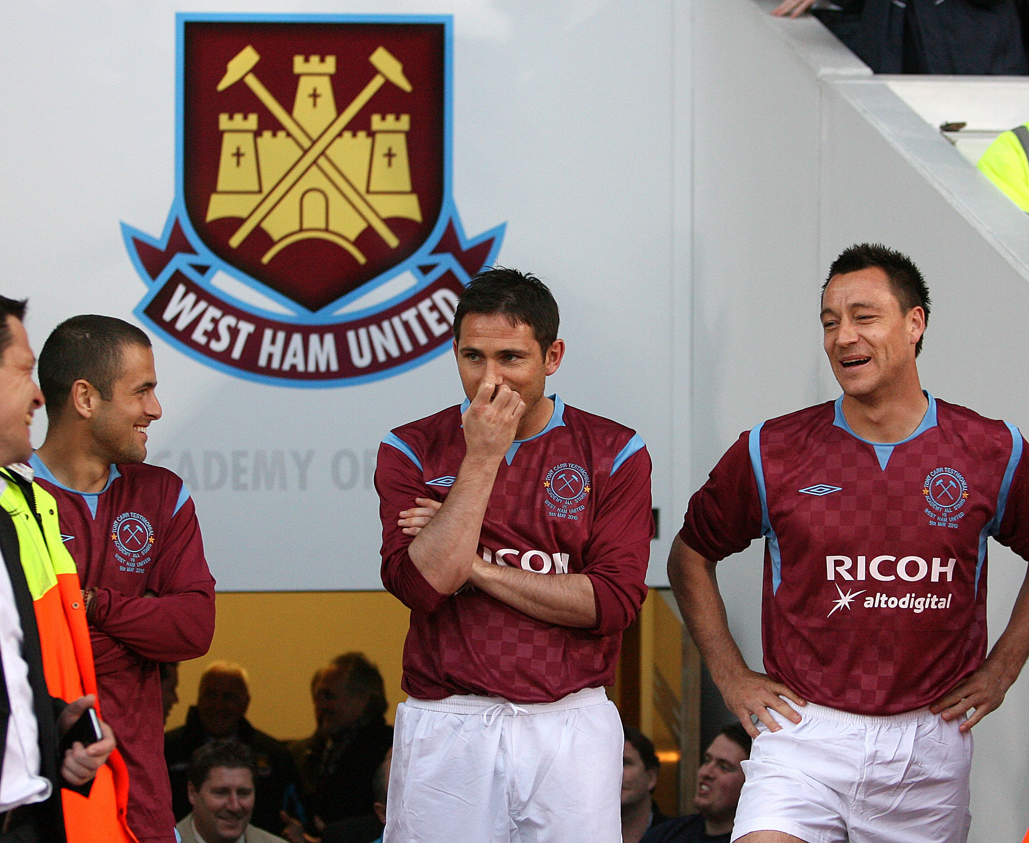 LONDON, ENGLAND - MAY 05 :  (L-R) Joe Cole, Frank Lampard and John Terry share a joke ahead of their introduction during the Tony Carr Testimonial match between the Academy All-Stars and West Ham United at the Boleyn Ground on May 05, 2010 in London, Engl