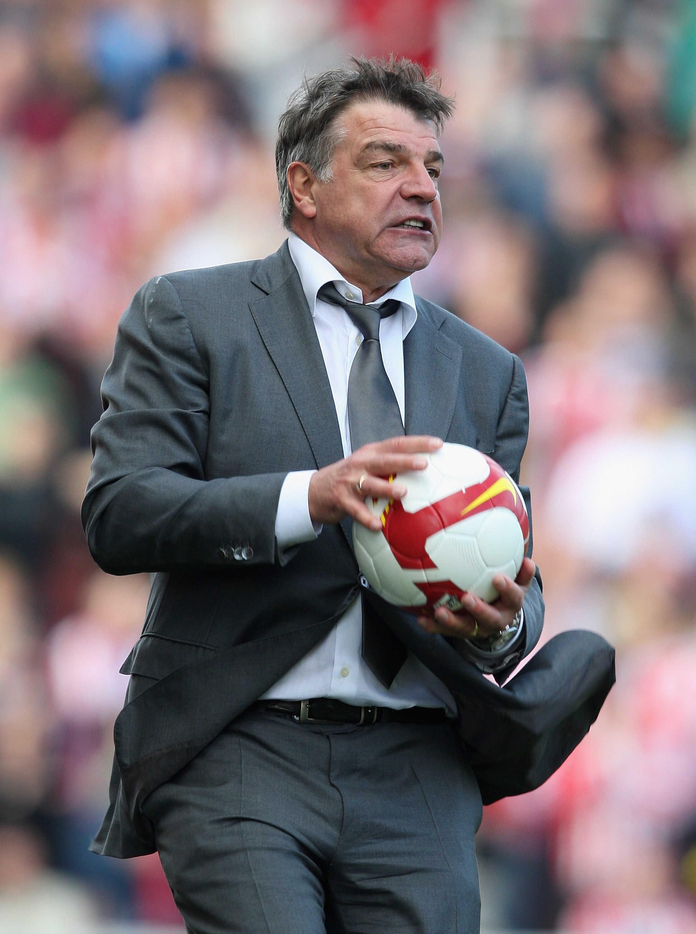 STOKE, ENGLAND - APRIL 18:  Blackburn Rovers Manager Sam Allardyce catches the ball during the Barclays Premier League match between Stoke City and Blackburn Rovers at The Britannia Stadium on April 18, 2009 in Stoke,England.  (Photo by Ross Kinnaird/Gett
