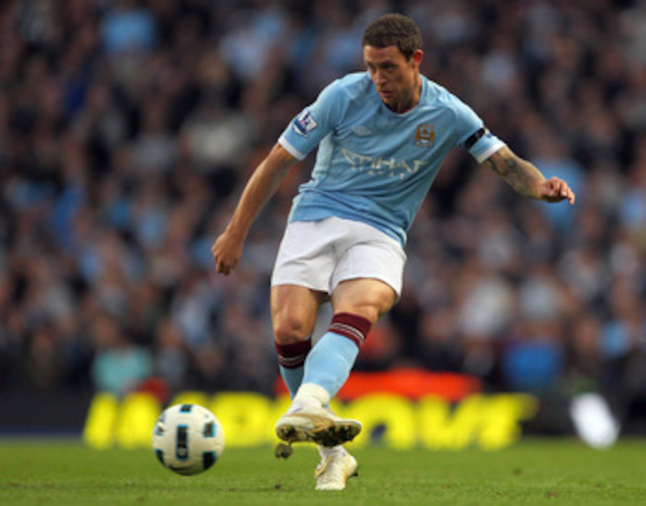 MANCHESTER, ENGLAND - OCTOBER 24:  Wayne Bridge of Manchester City in action during the Barclays Premier League match between Manchester City and Arsenal at City of Manchester Stadium on October 24, 2010 in Manchester, England.  (Photo by Clive Rose/Getty