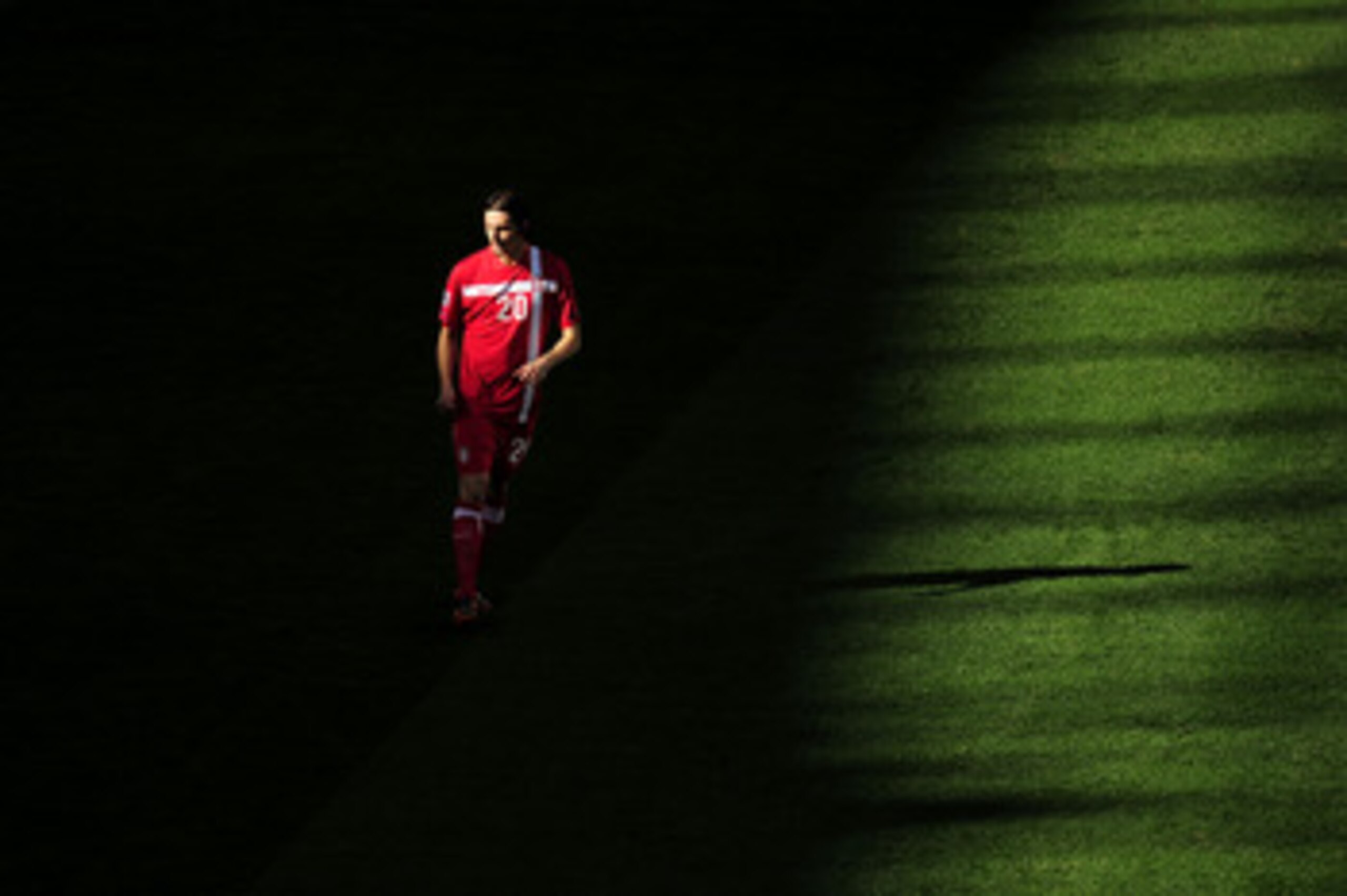 PORT ELIZABETH, SOUTH AFRICA - JUNE 18:  Neven Subotic of Serbia look on during the 2010 FIFA World Cup South Africa Group D match between Germany and Serbia at Nelson Mandela Bay Stadium on June 18, 2010 in Port Elizabeth, South Africa.  (Photo by Clive 