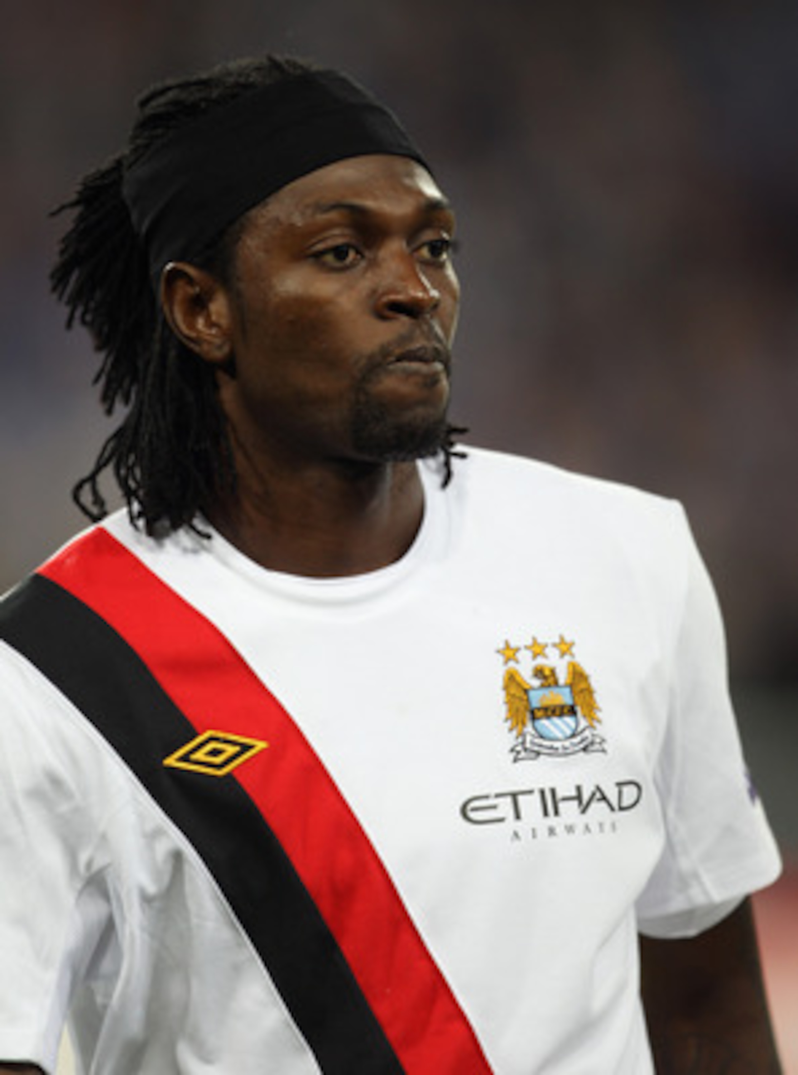 POZNAN, POLAND - NOVEMBER 04:  Emmanuel Adebayor of Manchester City looks on during the UEFA Europa League Group A match between KKS Lech Poznan and Manchester City at the Bulgarska Street Stadium on November 4, 2010 in Poznan, Poland.  (Photo by Bryn Len
