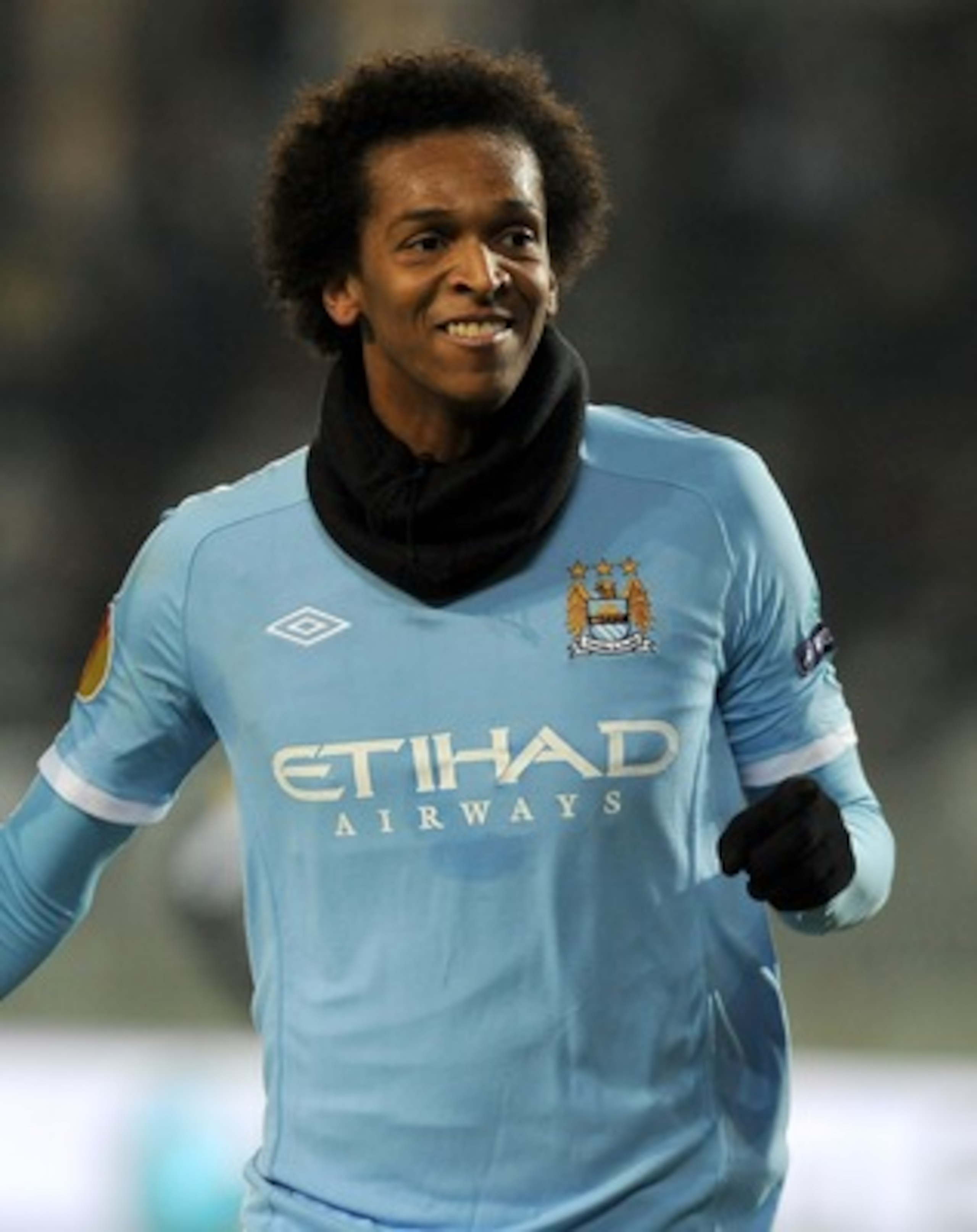 TURIN, ITALY - DECEMBER 16:  Jo ( R) of Manchester City celebrates after scoring City's equalising goal during the UEFA Europa League group A match between Juventus FC and Manchester City at Stadio Olimpico di Torino on December 16, 2010 in Turin, Italy. 
