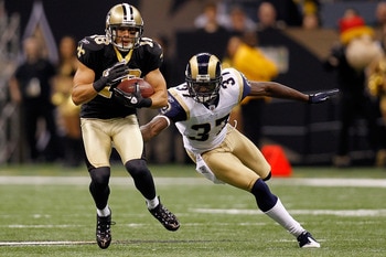 NEW ORLEANS, LA - DECEMBER 12:  Lance Moore #16 of the New Orleans Saints avoids a tackle by James Butler #37 of the St. Louis Rams at the Louisiana Superdome on December 12, 2010 in New Orleans, Louisiana. The Saints defeated the Rams 31-13.  (Photo by C