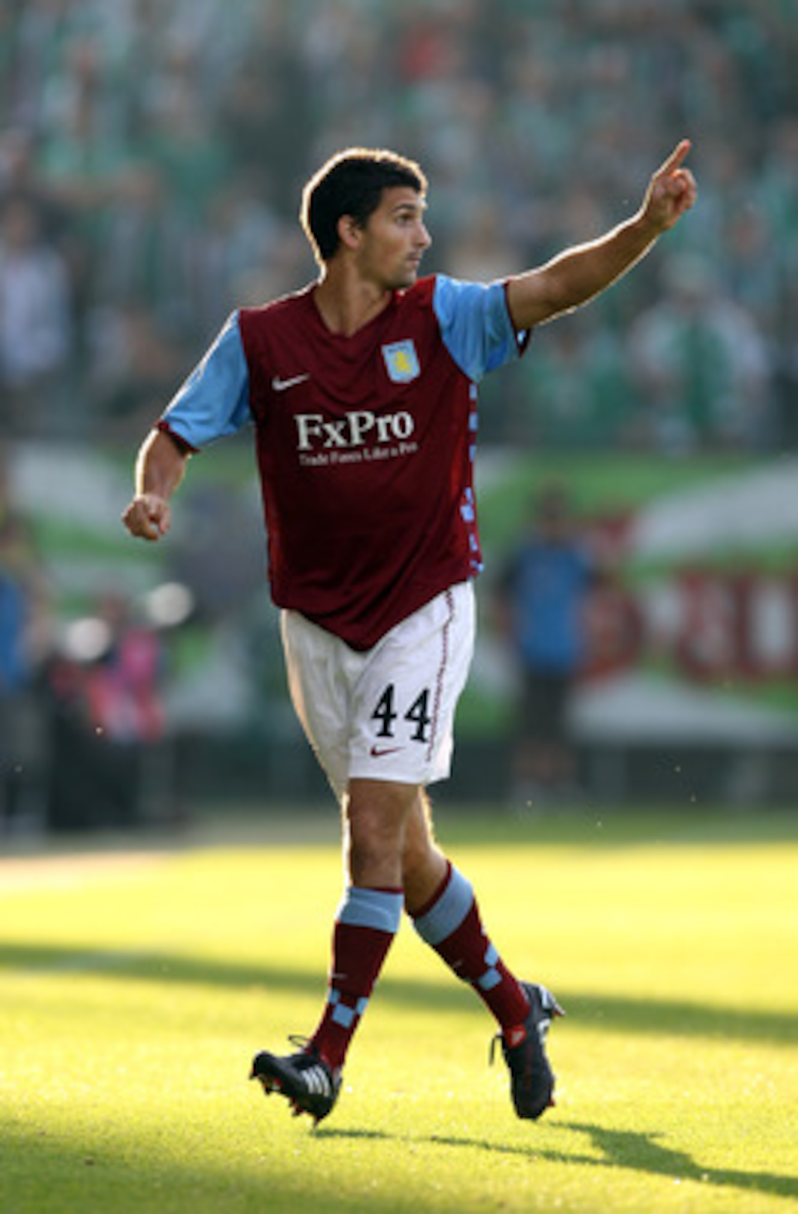 VIENNA, AUSTRIA - AUGUST 19:  Eric Lichaj of Aston Villa gestures during the UEFA Europa League, Play off, first leg Qualifying match between Rapid Vienna and Aston Villa at the Gerhard Hanappi Stadium on August 19, 2010 in Vienna, Austria.  (Photo by Ian