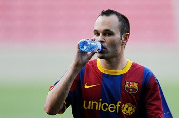 BARCELONA, SPAIN - MAY 23:  Andres Iniesta of FC Barcelona sips a drink during the FC Barcelona training session held ahead of next saturday UEFA Champions League Final at the Camp Nou Stadium on May 23, 2011 in Barcelona, Spain.  (Photo by David Ramos/Ge