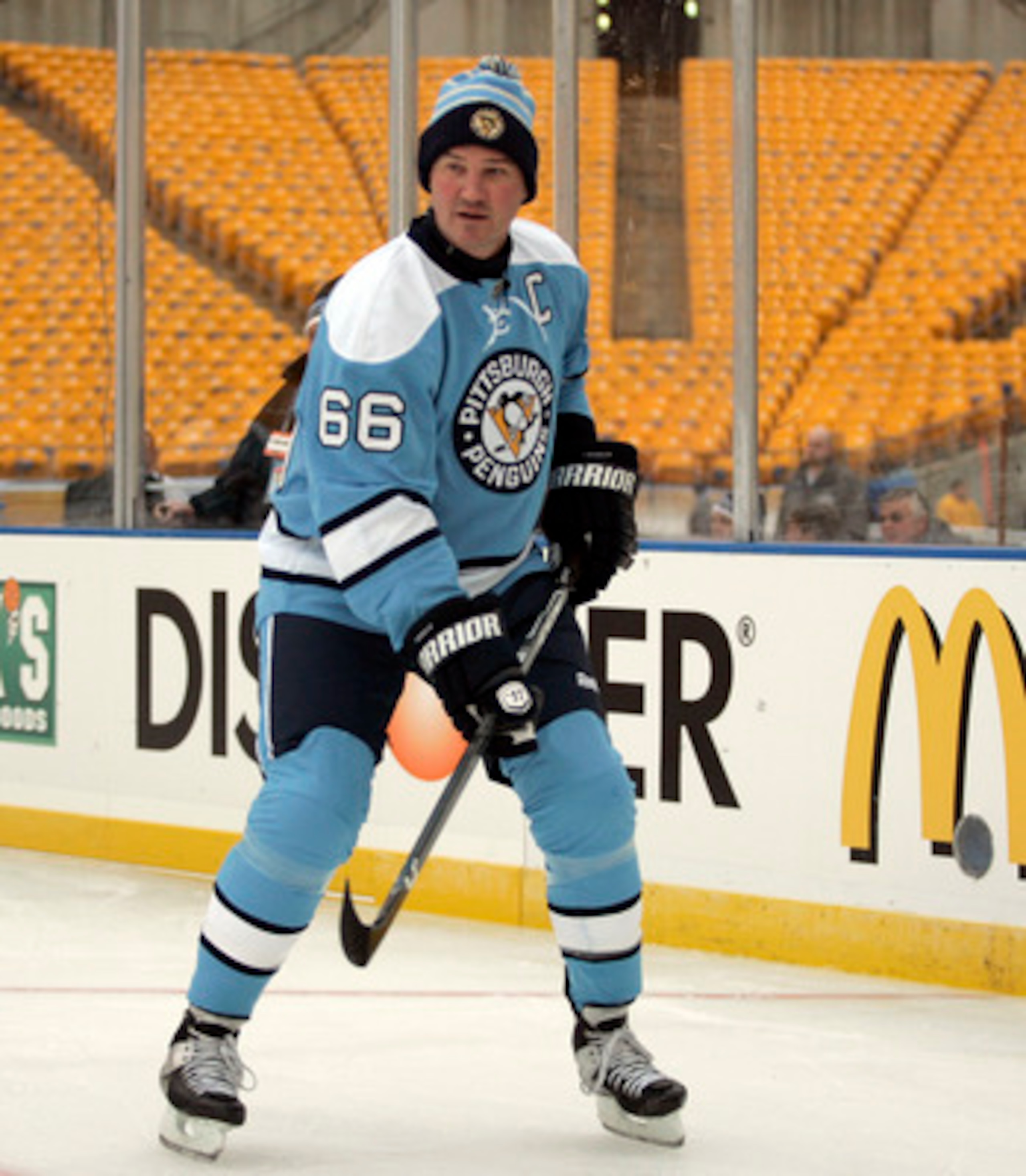 PITTSBURGH, PA - DECEMBER 31:  Mario Lemieux #66 of the Pittsburgh Penguins skates against the Washington Capitals during the 2011 NHL Winter Classic Alumni Game on December 31, 2010 at Heinz Field in Pittsburgh, Pennsylvania.  (Photo by Justin K. Aller/G