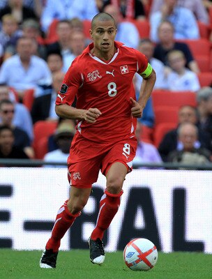 LONDON, ENGLAND - JUNE 04:  Gokhan Inler of Switzerland in action during the UEFA EURO 2012 group G qualifying match between England and Switzerland at Wembley Stadium on June 4, 2011 in London, England.  (Photo by David Cannon/Getty Images)