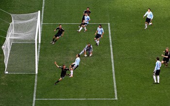 CAPE TOWN, SOUTH AFRICA - JULY 03:  Thomas Mueller of Germany celebrates scoring the opening goal past Sergio Romero of Argentina during the 2010 FIFA World Cup South Africa Quarter Final match between Argentina and Germany at Green Point Stadium on July