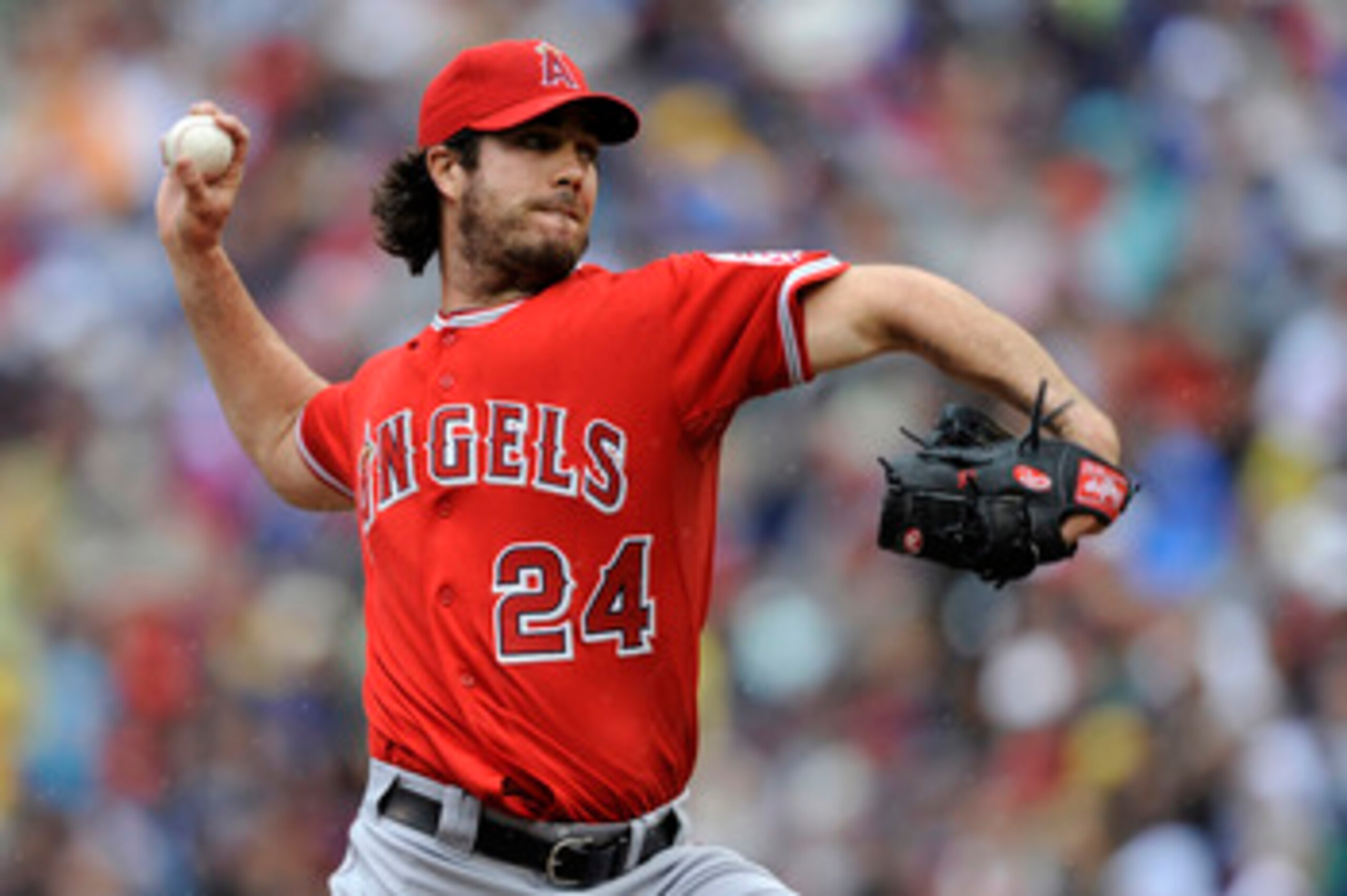 MINNEAPOLIS, MN - MAY 29: Dan Haren #24 of the Los Angeles Angels of Anaheim pitches against the Minnesota Twins during the first inning of their game on May 29, 2011 at Target Field in Minneapolis, Minnesota. (Photo by Hannah Foslien/Getty Images) MINNEAPOLIS, MN - MAY 29: Dan Haren #24 of the Los Angeles Angels of Anaheim pitches against the Minnesota Twins during the first inning of their game on May 29, 2011 at Target Field in Minneapolis, Minnesota. (Photo by Hannah Foslien/Getty Images)