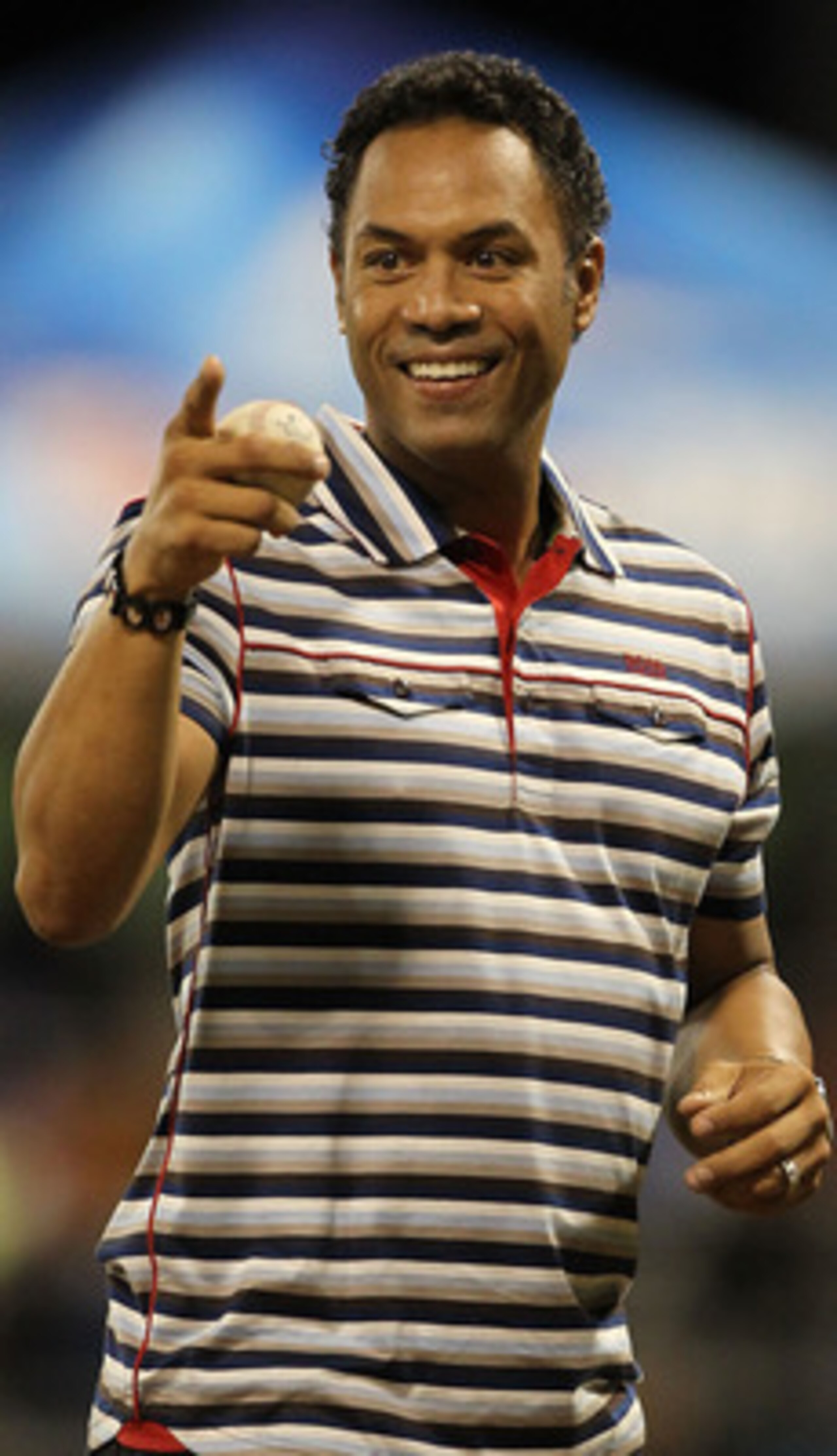 SAN JUAN, PUERTO RICO - JUNE 30:  Roberto Alomar Jr. throws out the first pitch before the game between the New York Mets and the Florida Marlins  during their game at Hiram Bithorn Stadium on June 30, 2010 in San Juan, Puerto Rico.  (Photo by Al Bello/Ge