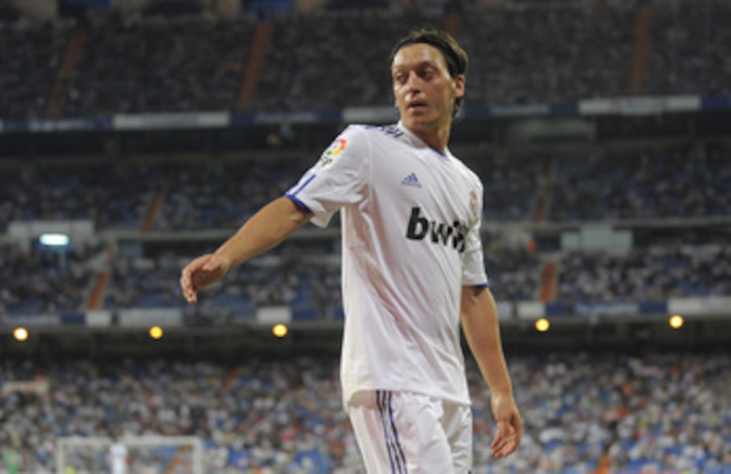 MADRID, SPAIN - MAY 21: Mesut Ozil of Real Madrid goes to take a corner kick during the La Liga match between Real Madrid and UD Almeria at Estadio Santiago Bernabeu on May 21, 2011 in Madrid, Spain. (Photo by Denis Doyle/Getty Images) MADRID, SPAIN - MAY 21: Mesut Ozil of Real Madrid goes to take a corner kick during the La Liga match between Real Madrid and UD Almeria at Estadio Santiago Bernabeu on May 21, 2011 in Madrid, Spain. (Photo by Denis Doyle/Getty Images)