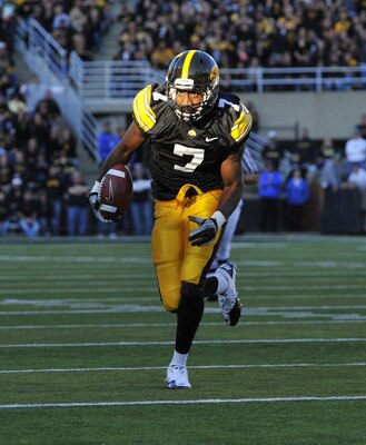 IOWA CITY, IA - OCTOBER 30- Wide receiver Marvin McNutt #7 of the University of Iowa Hawkeyes drives the ball into the end zone for a touch down during the second half of play against the Michigan State Spartans at Kinnick Stadium on October 30, 2010 in I