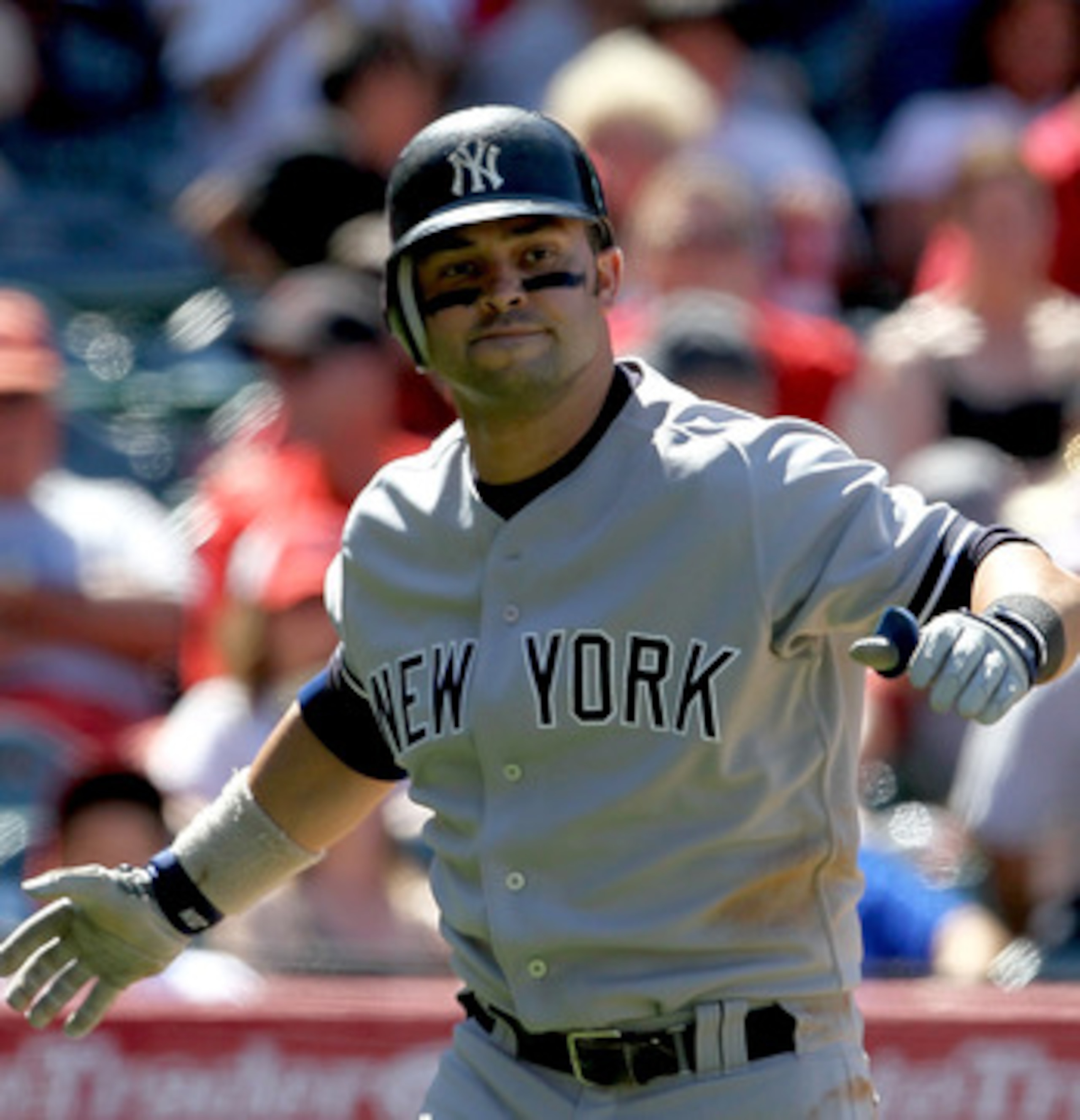 ANAHEIM, CA - JUNE 05:  Nick Swisher #33 of the New York Yankees celebrates after hitting a solo home run in the eighth inning against the Los Angeles Angels of Anaheim on June 5, 2011 at Angel Stadium in Anaheim, California.  The Yankees won 5-3.  (Photo