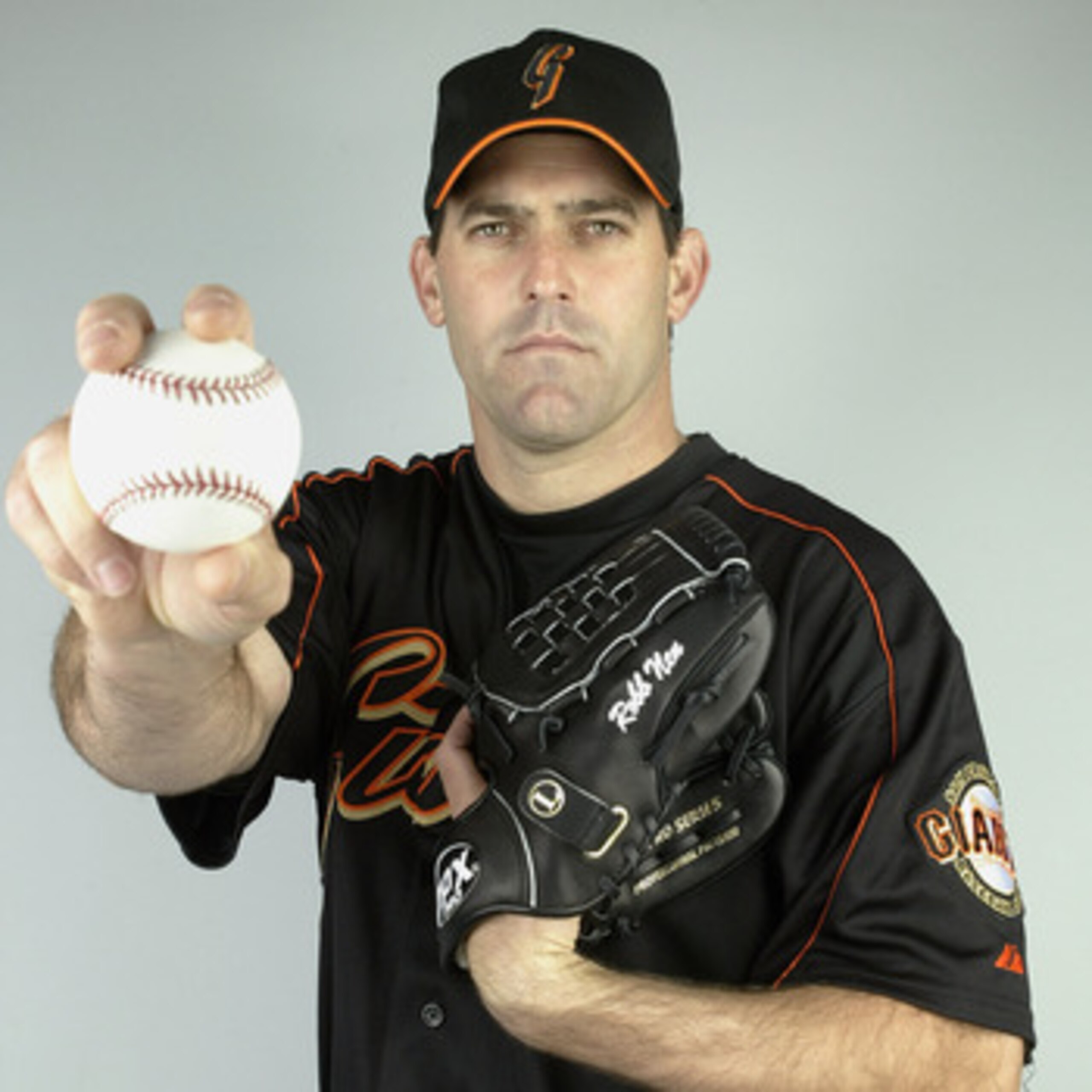 SCOTTSDALE, AZ - MARCH 2:  Pitcher Robb Nen #31 of the San Francisco Giants poses for a portrait during Photo Day on March 2, 2004 at Scottsdale Stadium in Scottsdale, Arizona. (Photo by Jeff Gross/Getty Images)