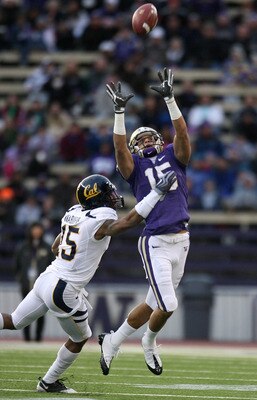 SEATTLE - DECEMBER 05:  Wide receiver Jermaine Kearse #15 of the Washington Huskies makes a leaping catch against Bryant Nnabuife #15 of the California Bears on December 5, 2009 at Husky Stadium in Seattle, Washington. The Huskies defeated the Bears 42-10
