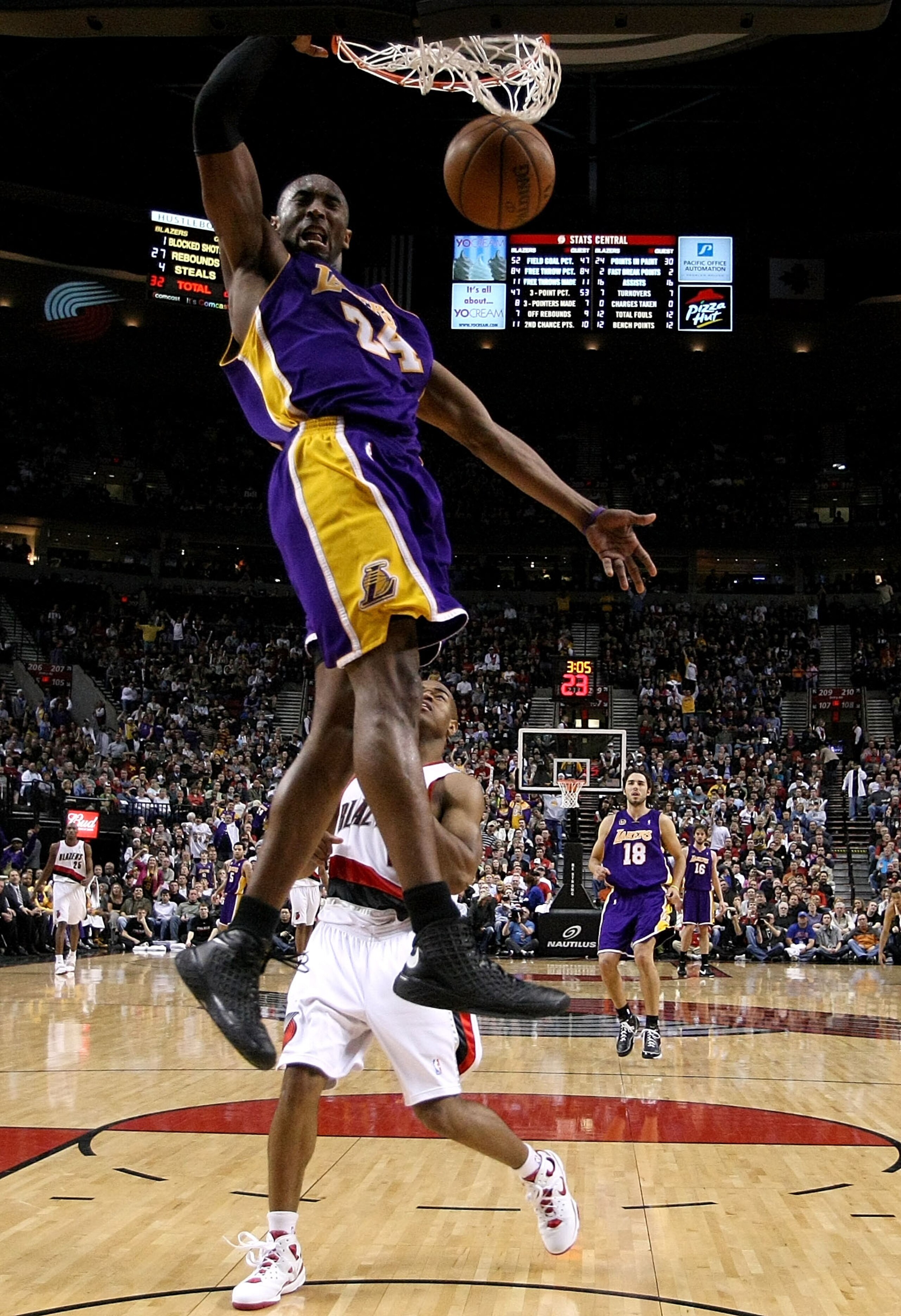 PORTLAND, OR - APRIL 08:  Kobe Bryant #24 of the Los Angeles Lakers dunks the ball over Jarrett Jack #1 the Portland Trail Blazers at the Rose Garden on April 8, 2008 in Portland, Oregon.  NOTE TO USER: User expressly acknowledges and agrees that, by down