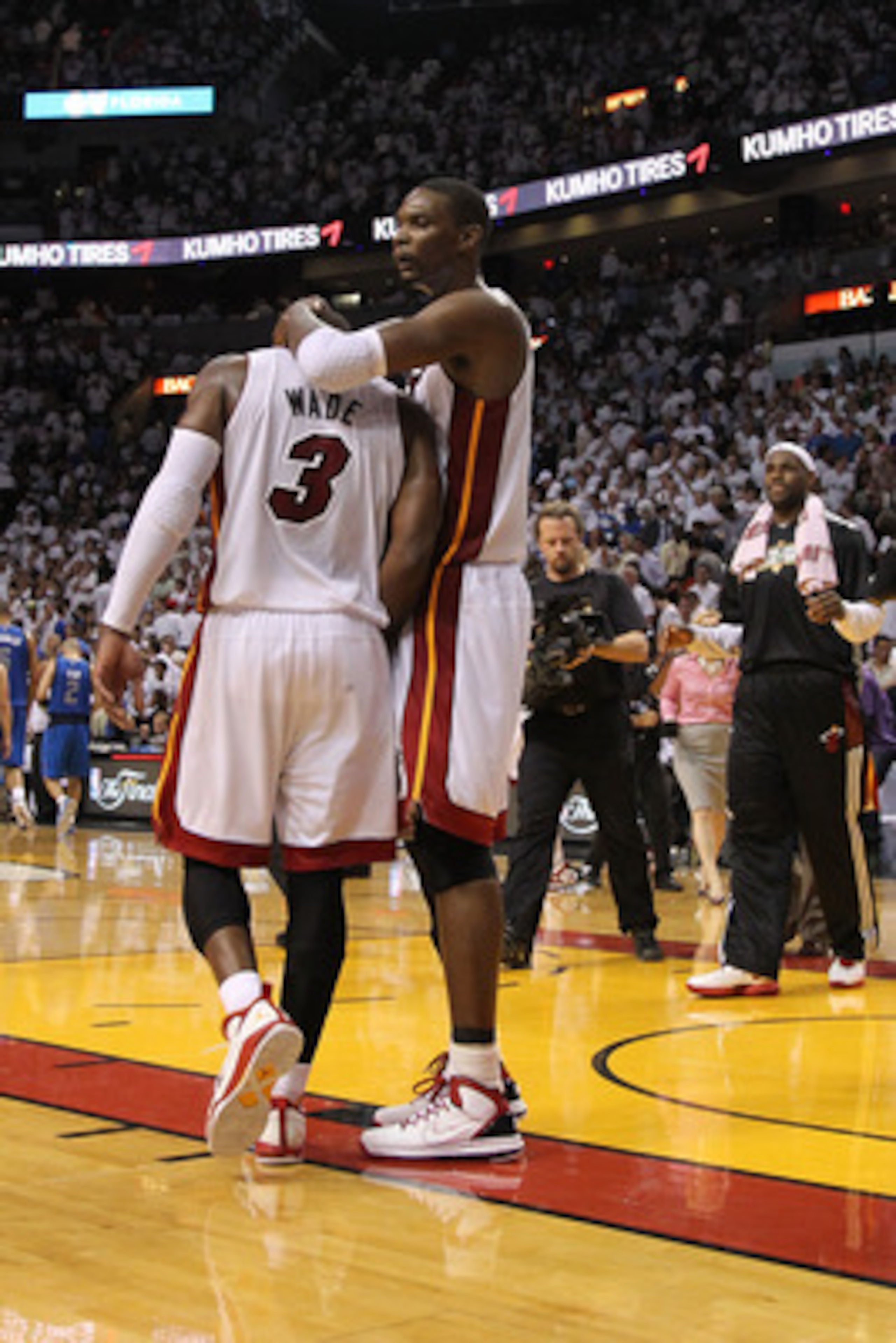 MIAMI, FL - JUNE 02:  Dwyane Wade #3 and Chris Bosh #1 of the Miami Heat react after a play against the Dallas Mavericks in Game Two of the 2011 NBA Finals at American Airlines Arena on June 2, 2011 in Miami, Florida. NOTE TO USER: User expressly acknowle