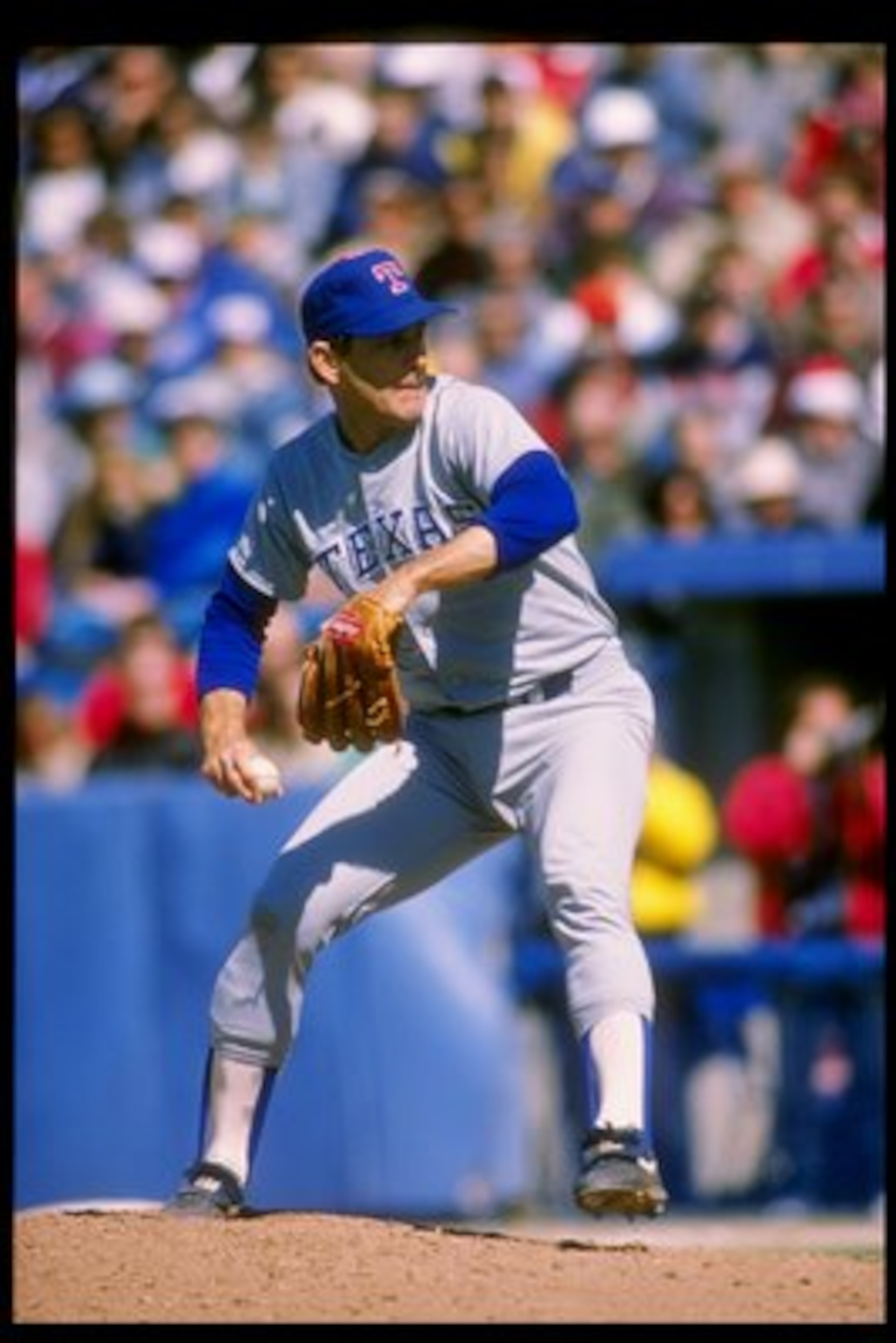 1991:  Pitcher Nolan Ryan of the Texas Rangers winds up for the pitch. Mandatory Credit: Rick Stewart  /Allsport