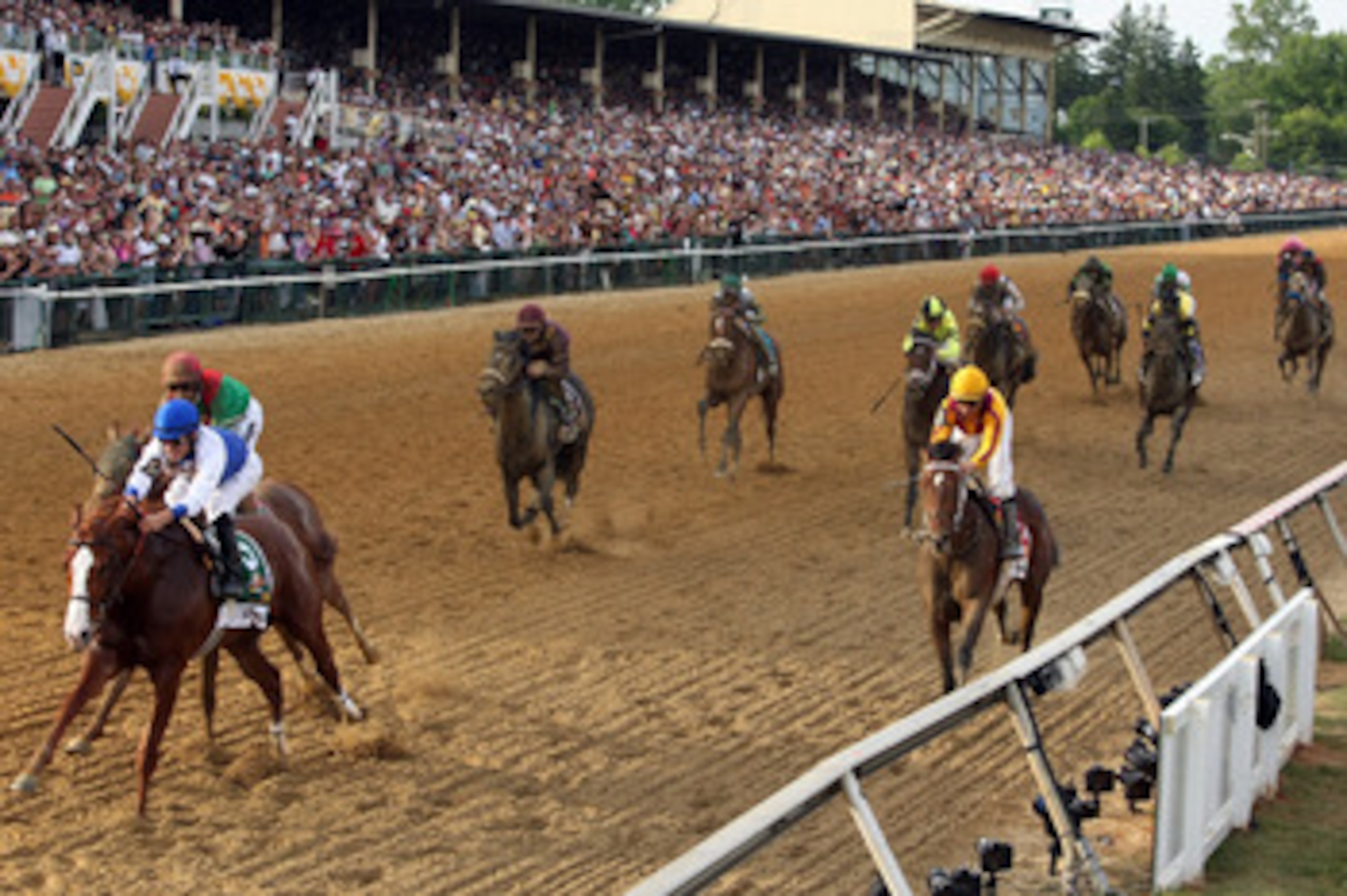 BALTIMORE, MD - MAY 21: Jockey Jesus Castanon guides Shackleford #5 (C) to victory over Animal Kingdom and jocky John Velazquez #11 (L) and Astrology with jockey Mike Smith #1 (R) to win the 136th running of the Preakness Stakes at Pimlico Race Course on BALTIMORE, MD - MAY 21: Jockey Jesus Castanon guides Shackleford #5 (C) to victory over Animal Kingdom and jocky John Velazquez #11 (L) and Astrology with jockey Mike Smith #1 (R) to win the 136th running of the Preakness Stakes at Pimlico Race Course on