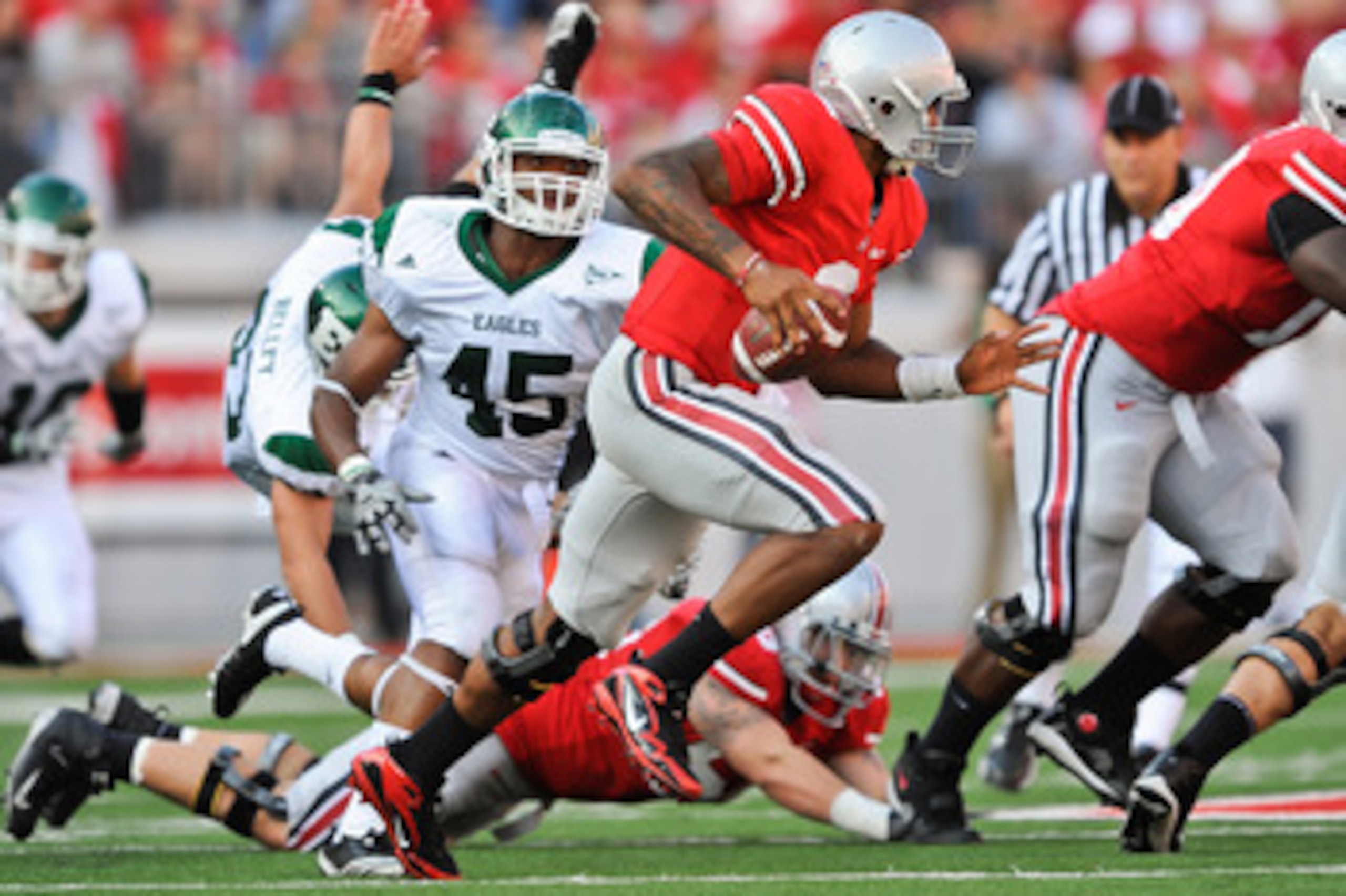 COLUMBUS, OH - SEPTEMBER 25:  Linebacker Matt Boyd #45 of the Eastern Michigan Eagles chases down quarterback Terrelle Pryor #2 of the Ohio State Buckeyes at Ohio Stadium on September 25, 2010 in Columbus, Ohio.  Ohio State won 73-20. (Photo by Jamie Saba