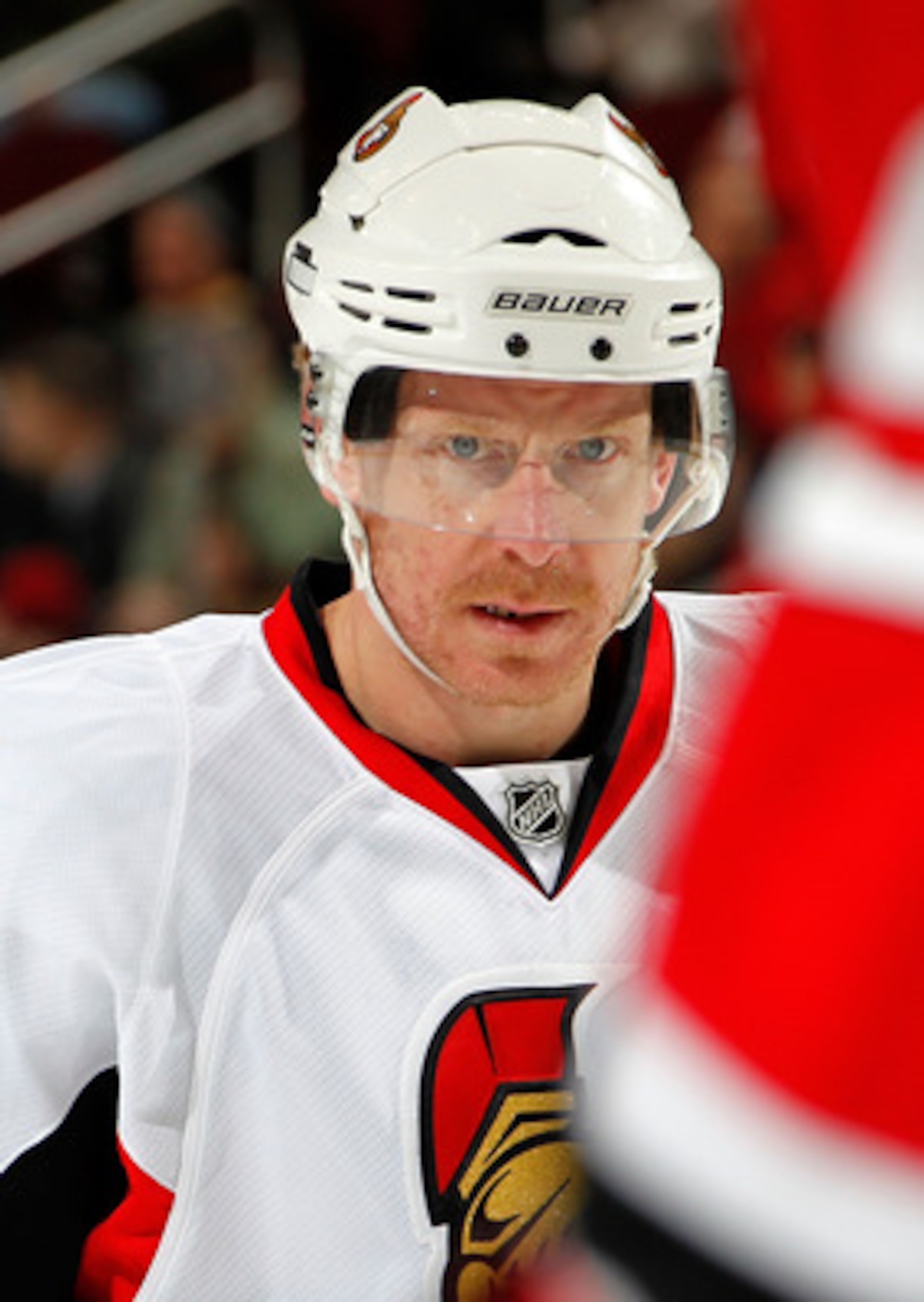 NEWARK, NJ - FEBRUARY 01:  Daniel Alfredsson #11 of the Ottawa Senators waits for a faceoff in an NHL hockey game against the New Jersey Devils at the Prudential Center on February 1, 2011 in Newark, New Jersey.  (Photo by Paul Bereswill/Getty Images)