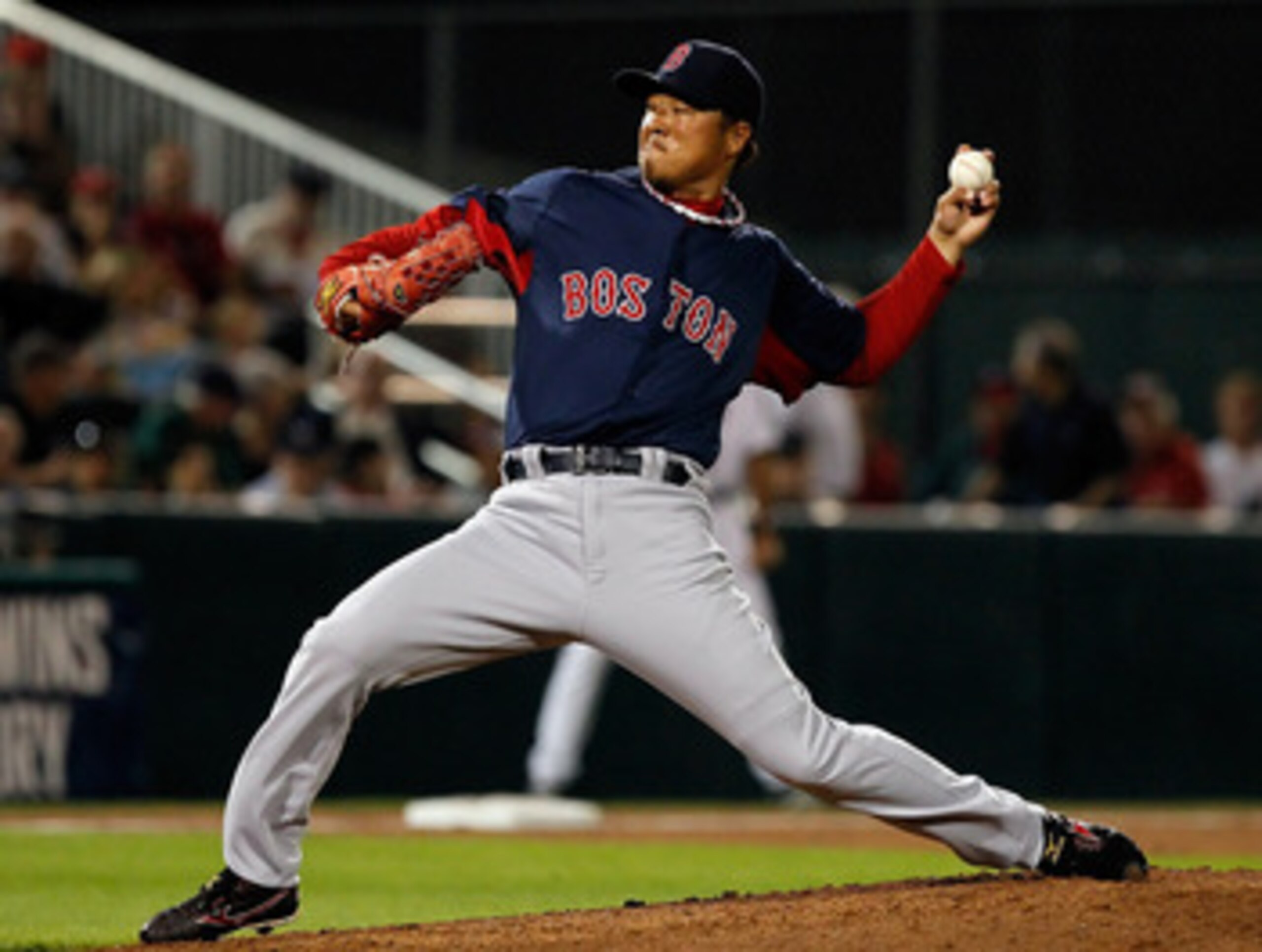 FORT MYERS, FL - FEBRUARY 27:  Pitcher Hideki Okajima #37 of the Boston Red Sox pitches against the Minnesota Twins during a Grapefruit League Spring Training Game at Hammond Stadium on February 27, 2011 in Fort Myers, Florida.  (Photo by J. Meric/Getty I