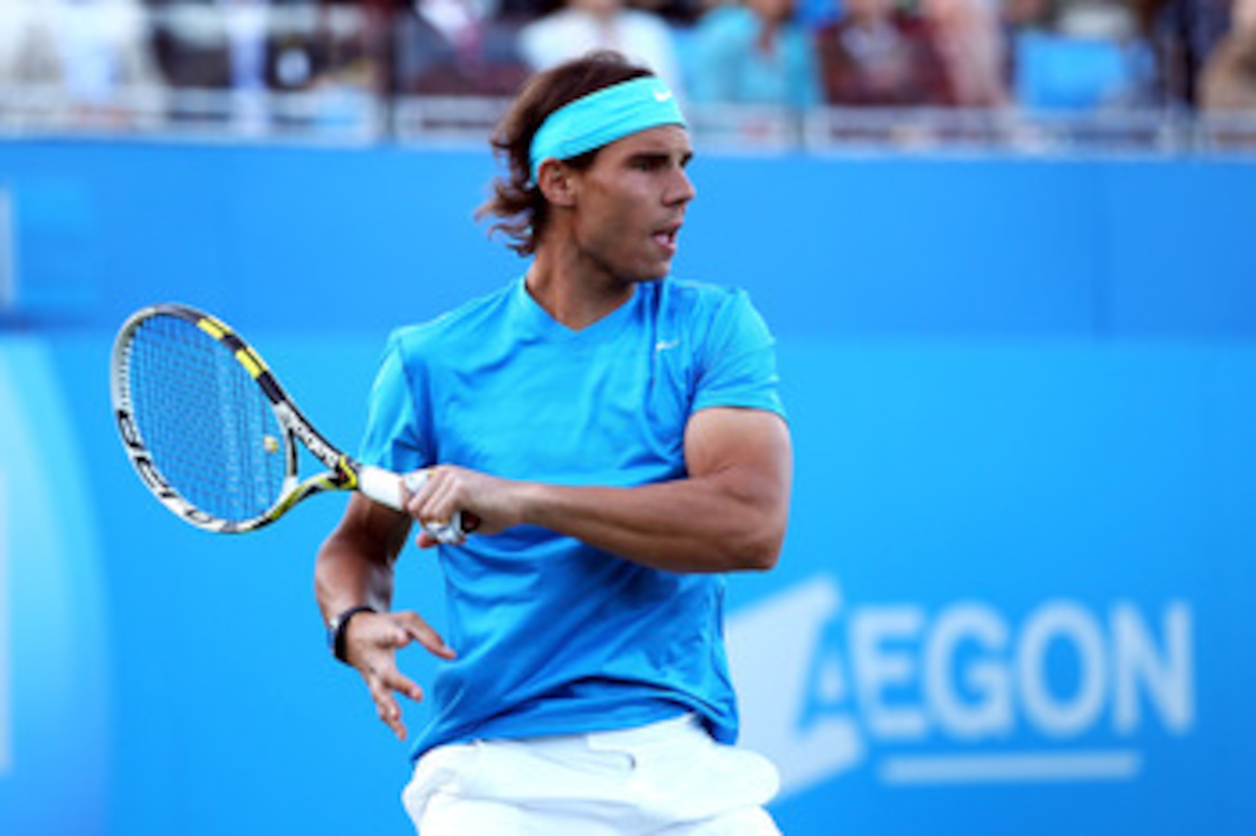 LONDON, ENGLAND - JUNE 07: Rafael Nadal of Spain in action during his Men's Doubles first round match with partner Marc Lopez of Spain against Thomaz Bellucci and Andre Sa of Brazil on day two of the AEGON Championships at Queens Club on June 7, 2011 in LONDON, ENGLAND - JUNE 07: Rafael Nadal of Spain in action during his Men's Doubles first round match with partner Marc Lopez of Spain against Thomaz Bellucci and Andre Sa of Brazil on day two of the AEGON Championships at Queens Club on June 7, 2011 in