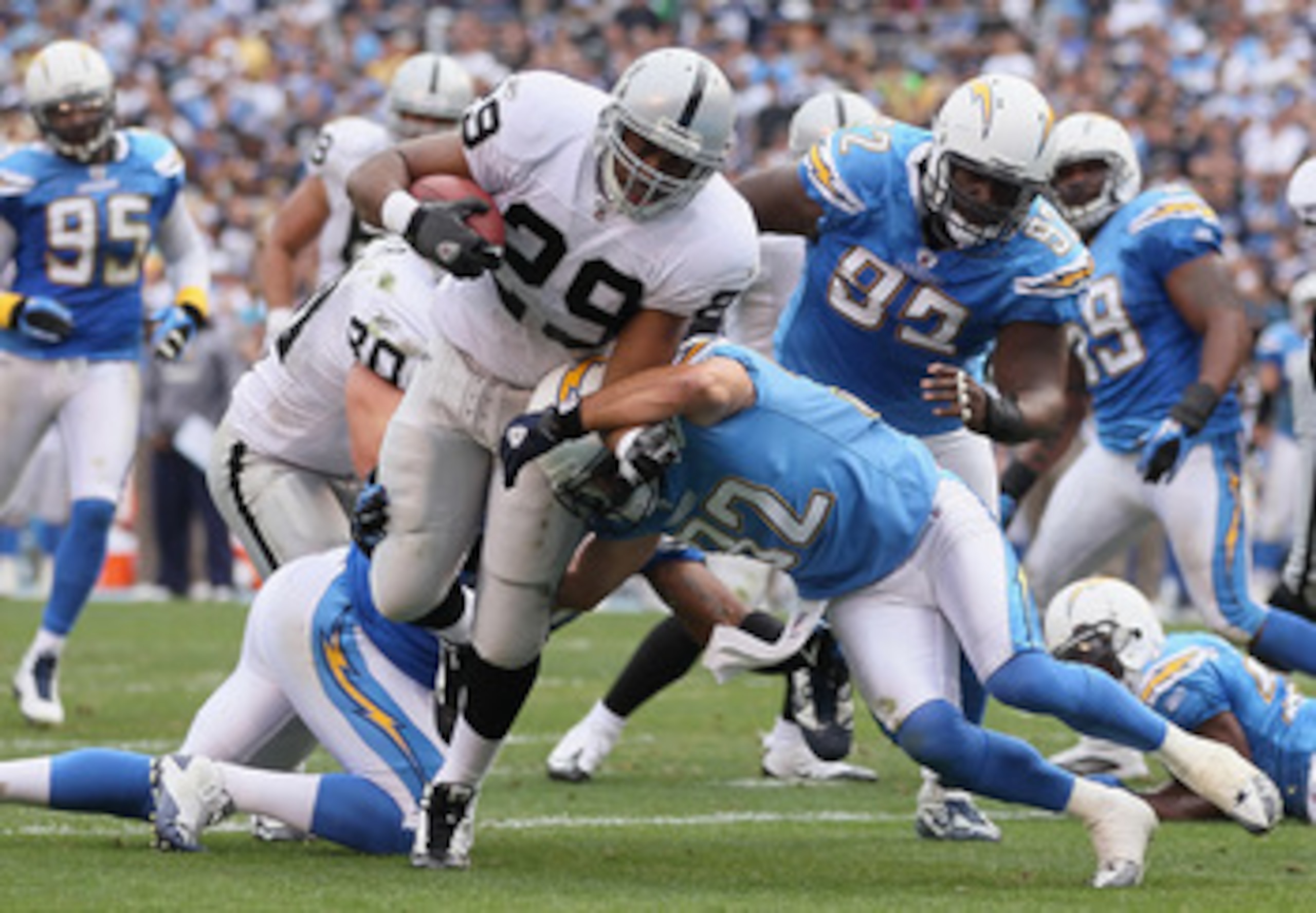SAN DIEGO - DECEMBER 05:  Running back Michael Bush #29 of the Oakland Raiders carries the ball for a touchdown in the second quarter against the San Diego Chargers at Qualcomm Stadium on December 5, 2010 in San Diego, California. The Raiders defeated the