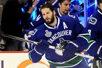 VANCOUVER, BC - JUNE 04:  Ryan Kesler #17 and Kevin Bieksa #3 of the Vancouver Canucks take to the ice prior to playing against the Boston Bruins in Game Two of the 2011 NHL Stanley Cup Final at Rogers Arena on June 4, 2011 in Vancouver, British Columbia,