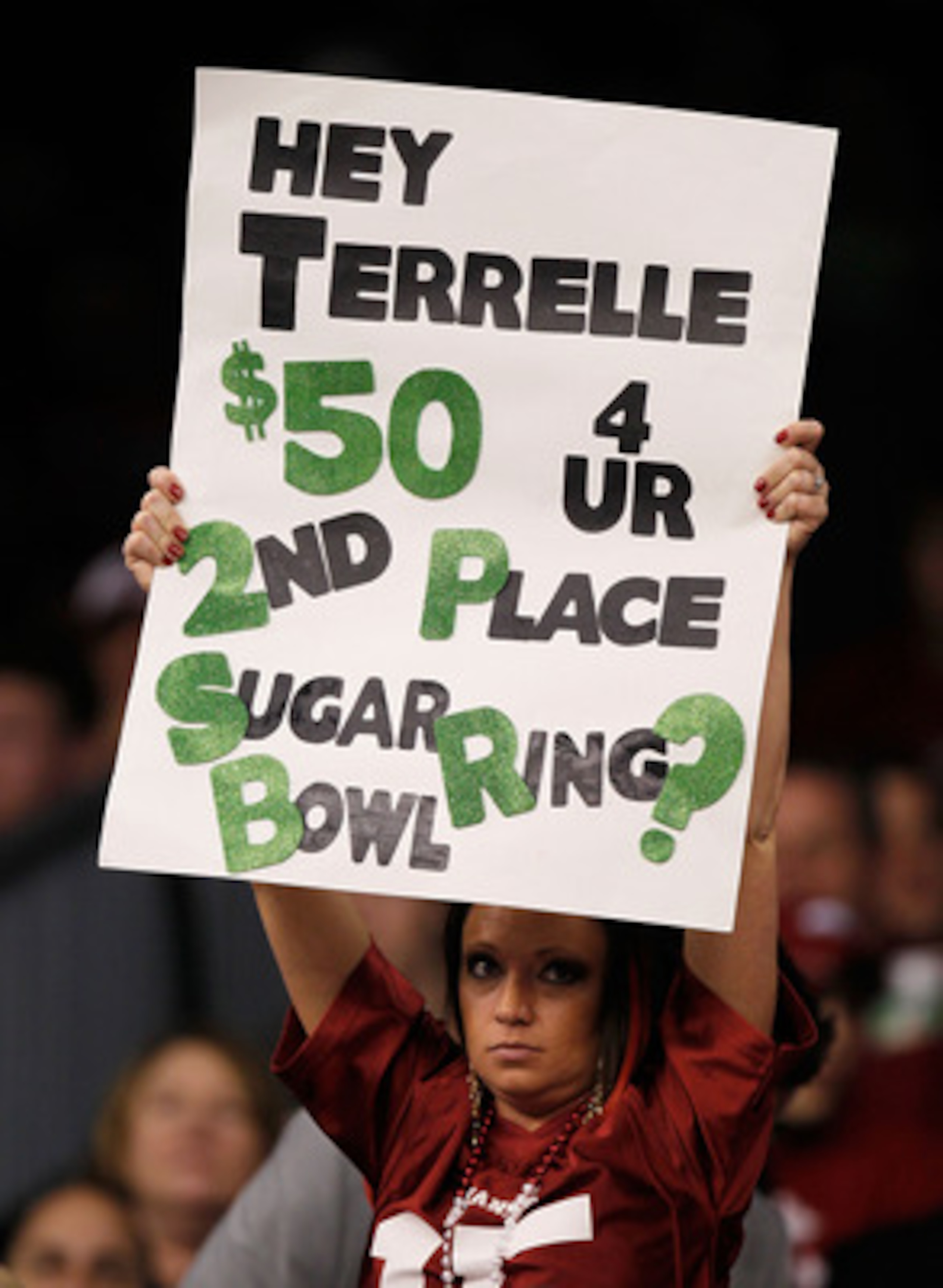 NEW ORLEANS, LA - JANUARY 04:  A Arkansas Razorbacks fan holds up a sign refering to Ohio State Buckeyes quarterback Terrelle Pryor during the Allstate Sugar Bowl at the Louisiana Superdome on January 4, 2011 in New Orleans, Louisiana.  (Photo by Kevin C.