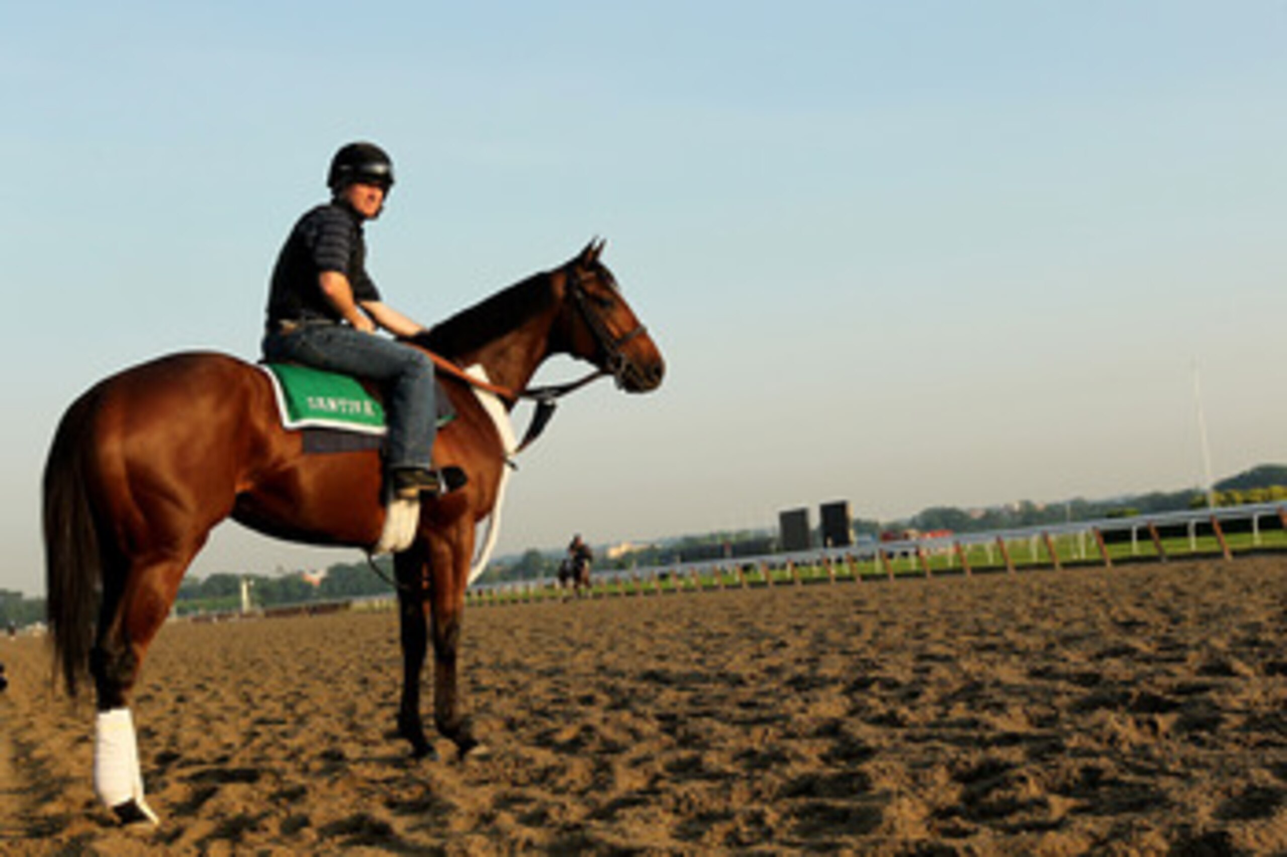 ELMONT, NY - JUNE 08: Santiva, ridden by Brendan Walsh, waits to enter the track during a training session in preparation for The Belmont Stakes at Belmont Park on June 8, 2011 in Elmont, New York. (Photo by Al Bello/Getty Images) ELMONT, NY - JUNE 08: Santiva, ridden by Brendan Walsh, waits to enter the track during a training session in preparation for The Belmont Stakes at Belmont Park on June 8, 2011 in Elmont, New York. (Photo by Al Bello/Getty Images)